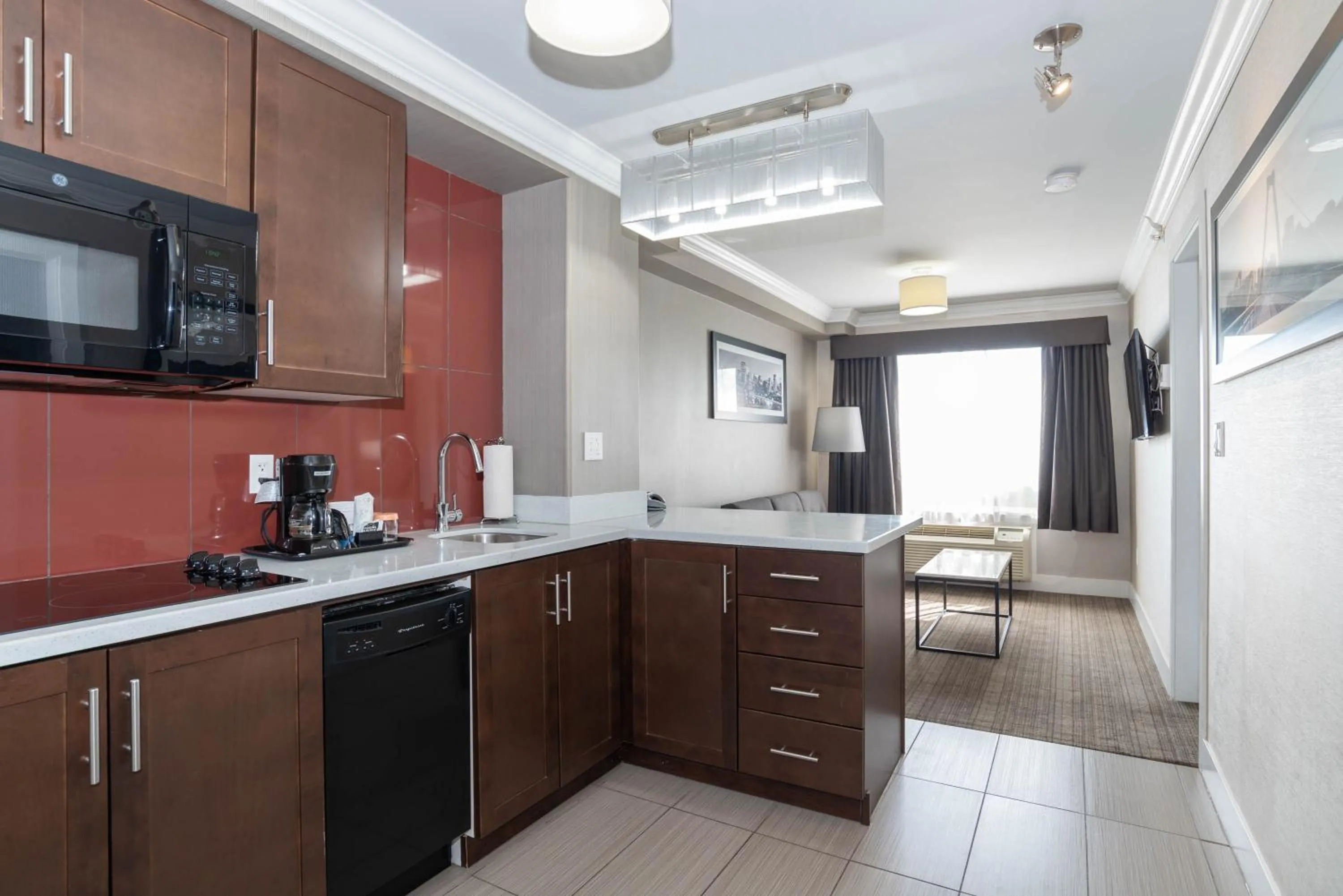 Kitchen or kitchenette in Sandman Hotel & Suites Calgary South