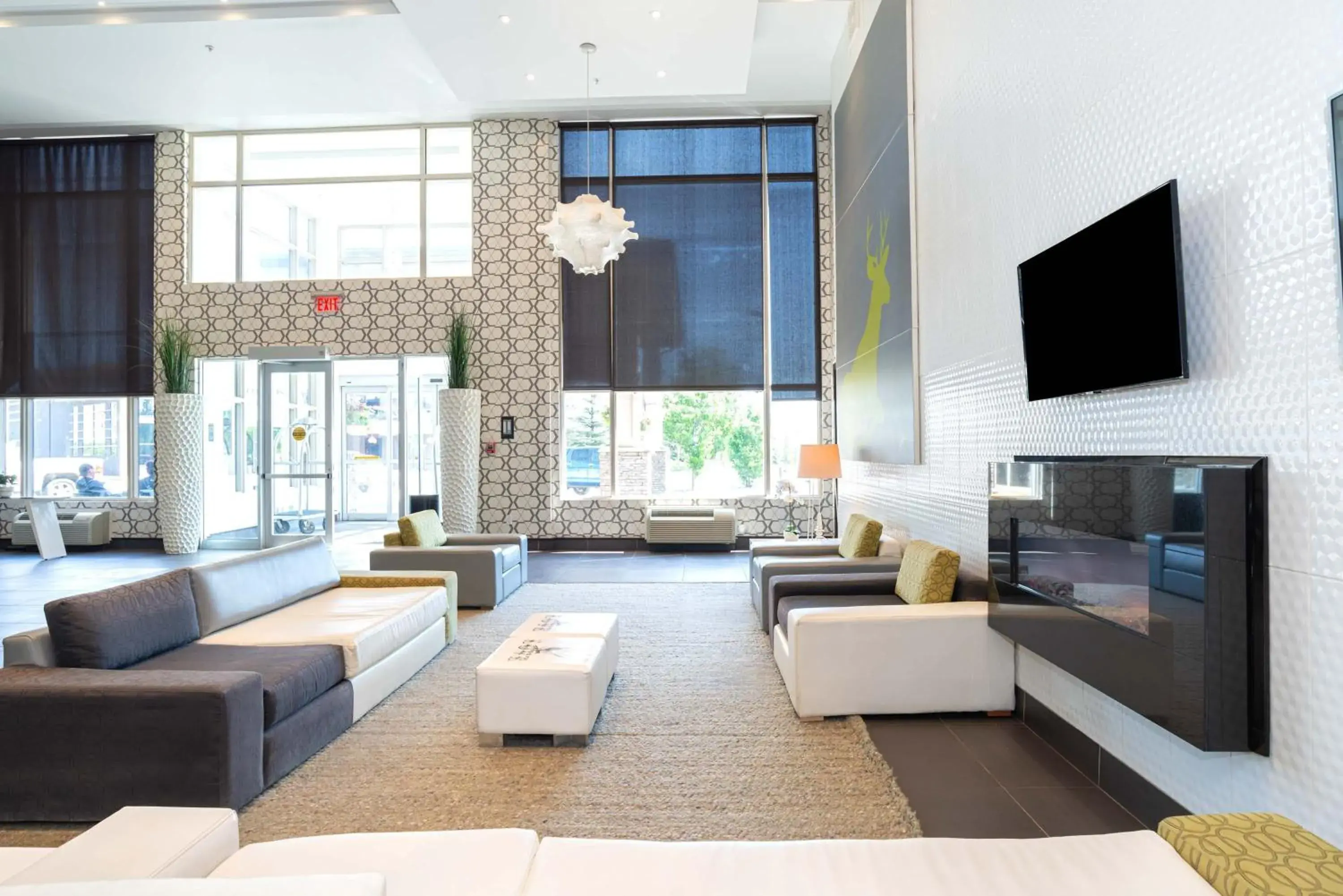 Lobby or reception, Bed in Sandman Hotel & Suites Calgary South Lobby or reception, Bed in Sandman Hotel & Suites Calgary South