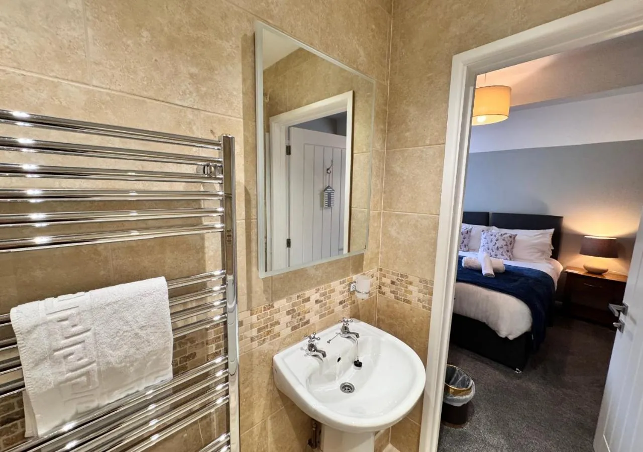 Bed in The Waterfront Inn