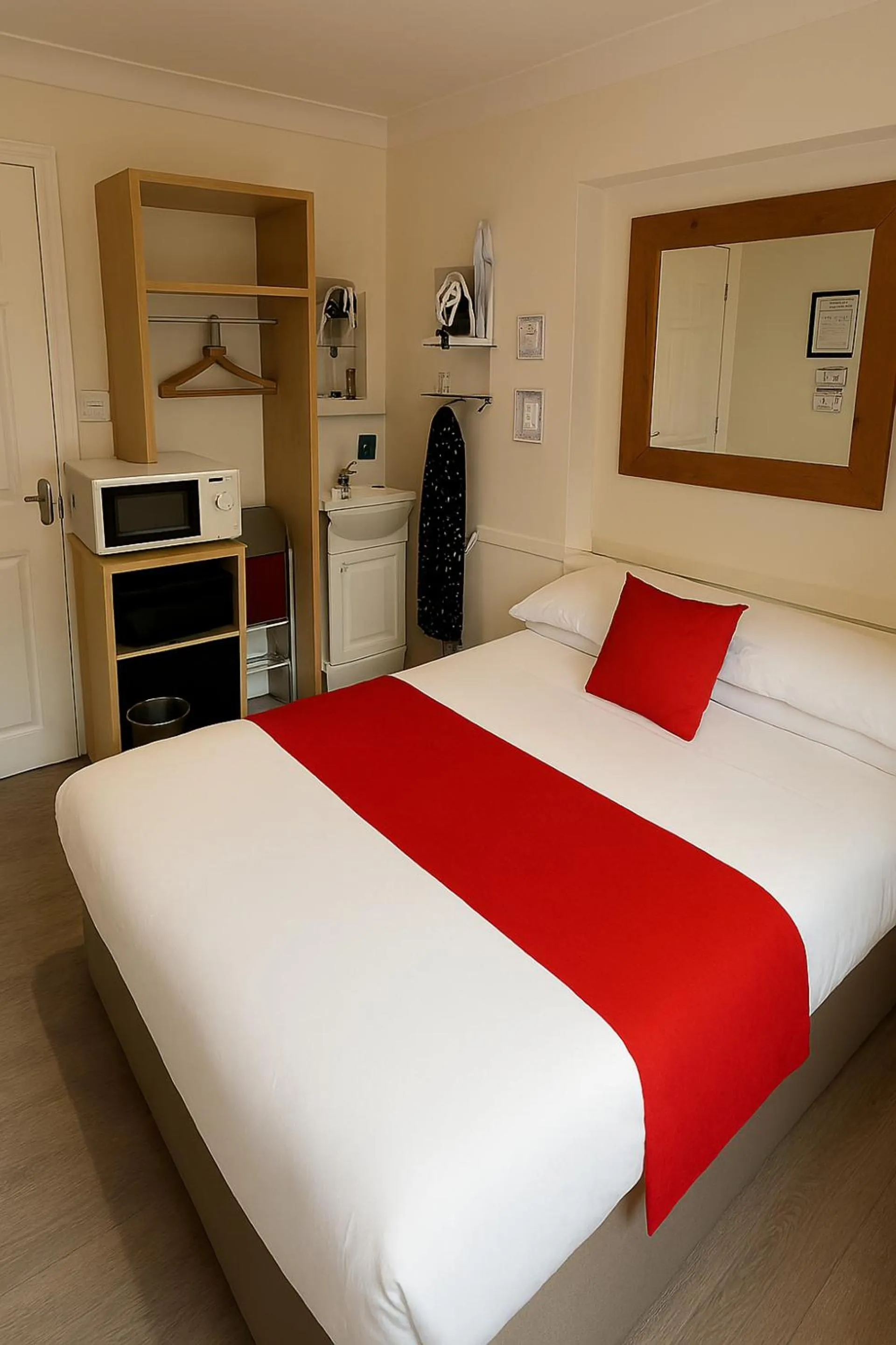 Bed in The Railway Sleeper Lodge