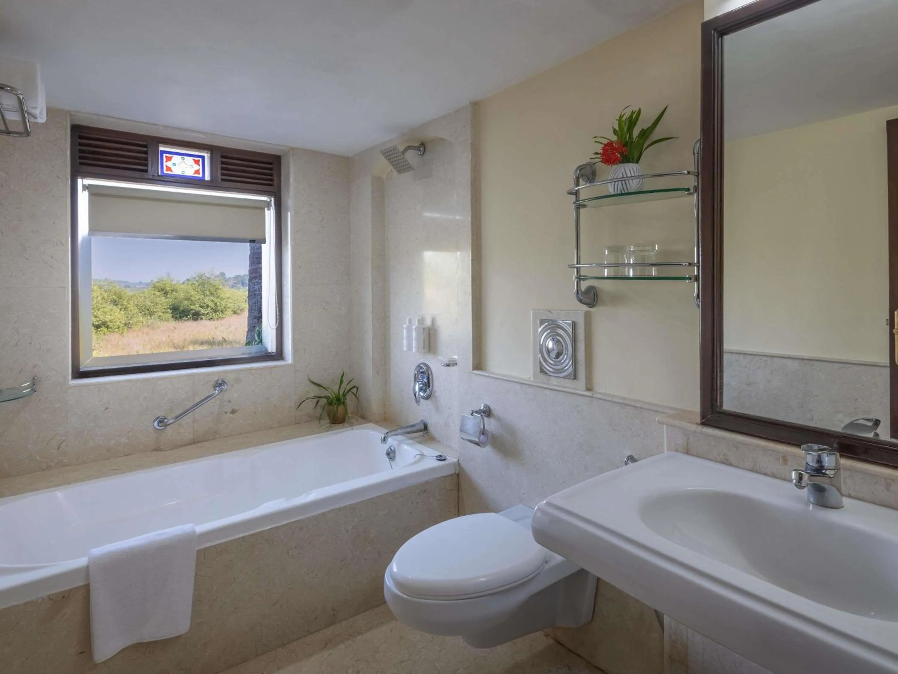 Bedroom in Mercure Goa Devaaya Resort