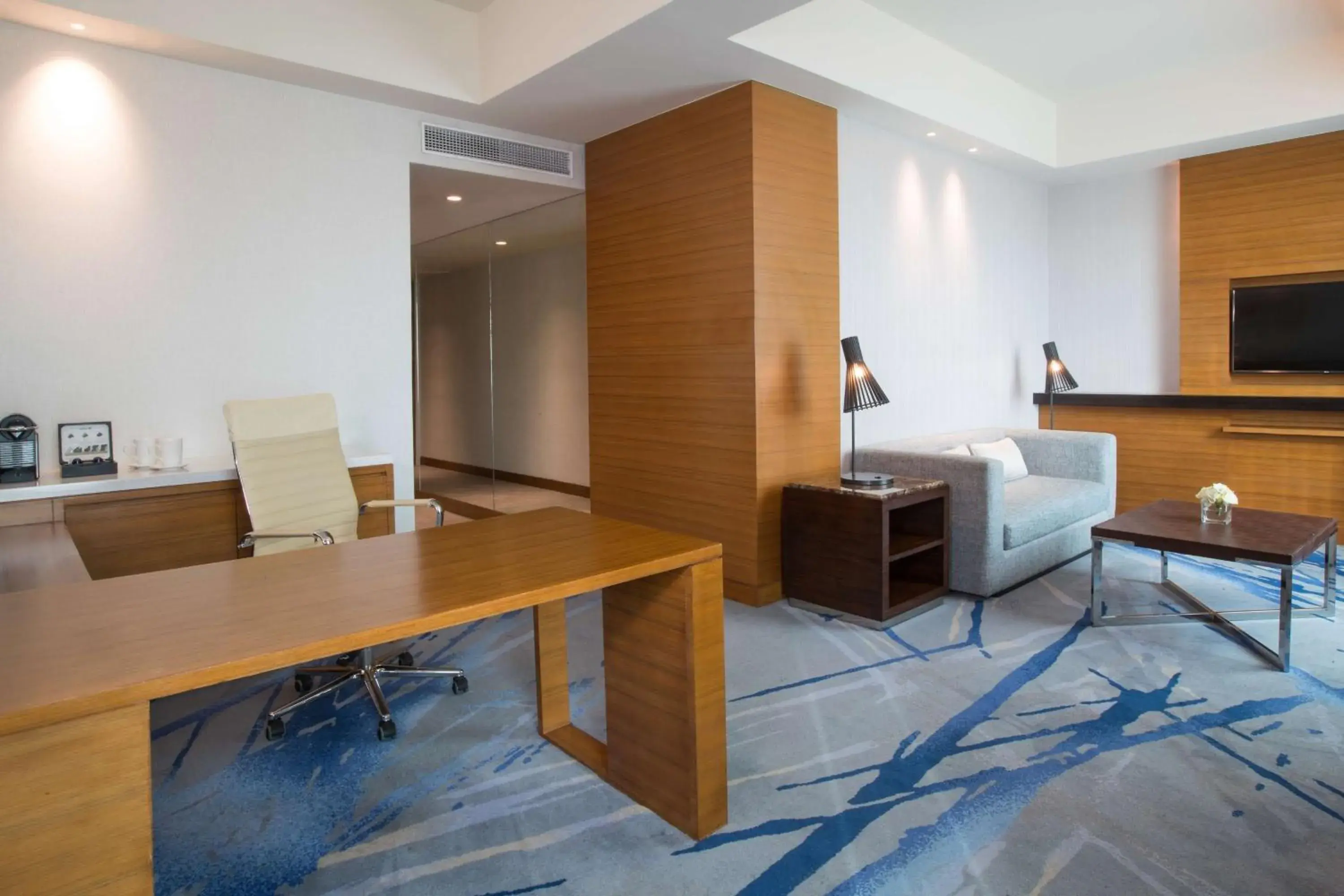 Communal lounge/ TV room, Bed in Radisson Blu Cebu Communal lounge/ TV room, Bed in Radisson Blu Cebu