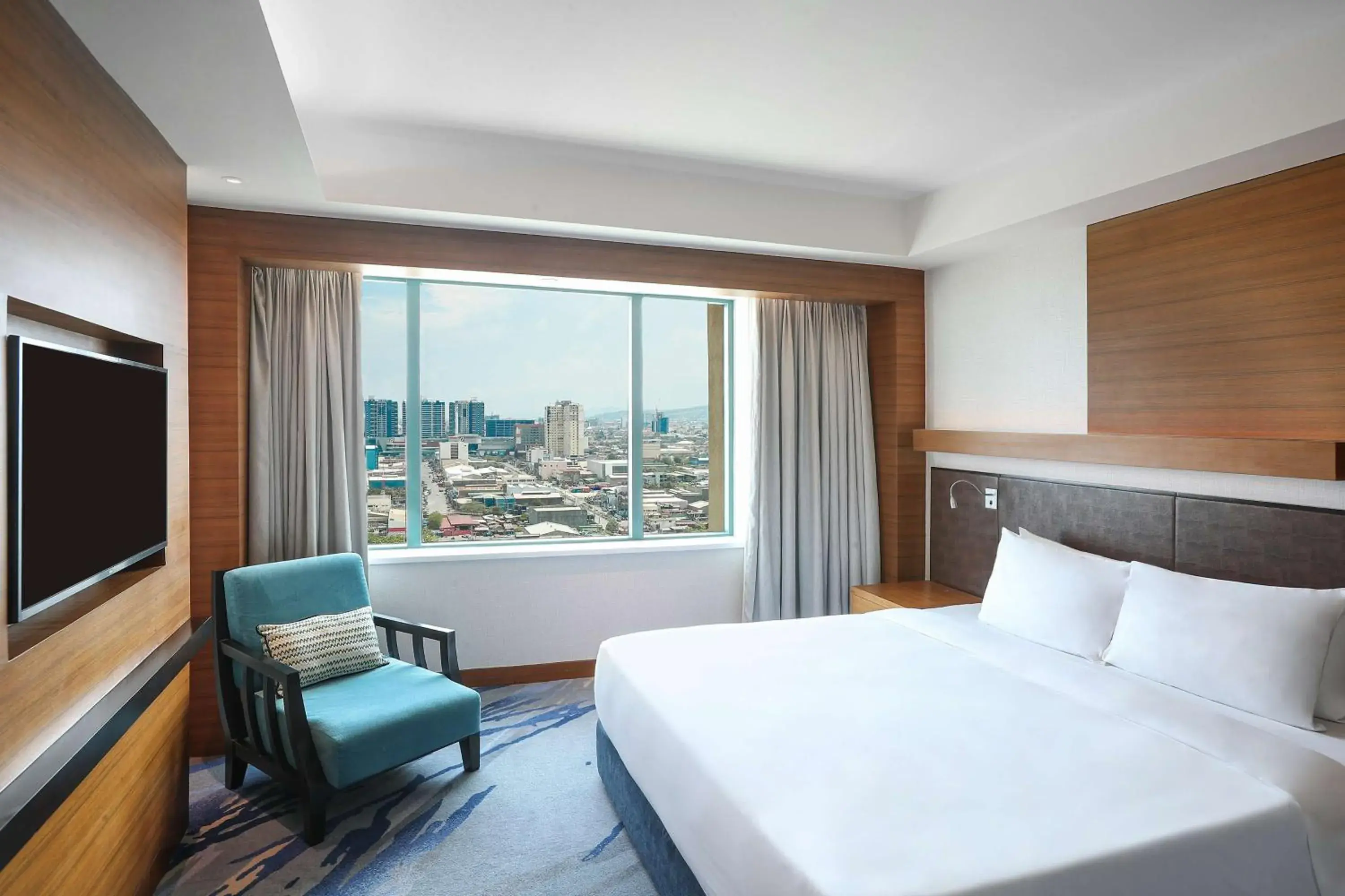 Photo of the whole room, Bed in Radisson Blu Cebu Photo of the whole room, Bed in Radisson Blu Cebu