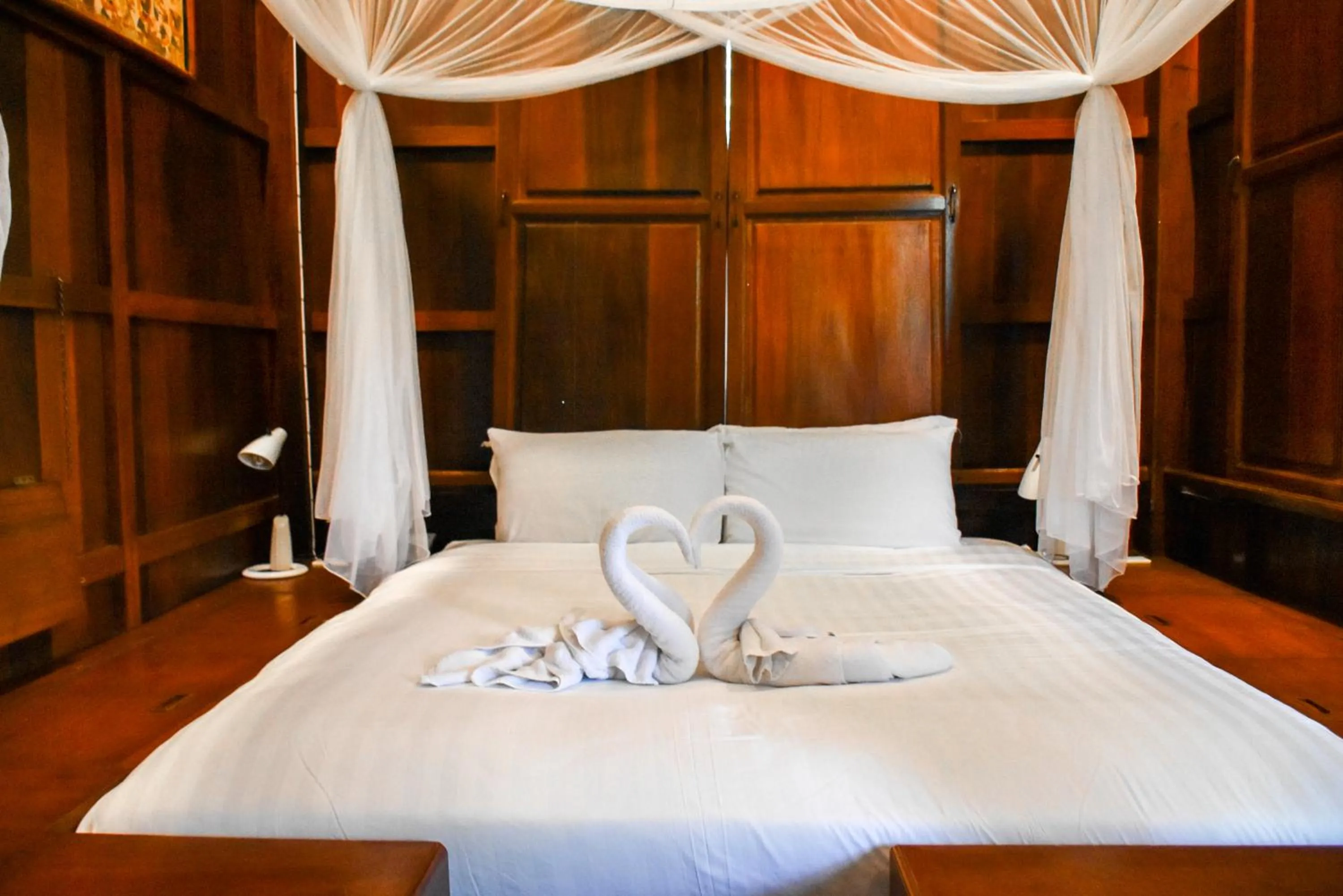 Bed in Sugar Hut Resort & Restaurant