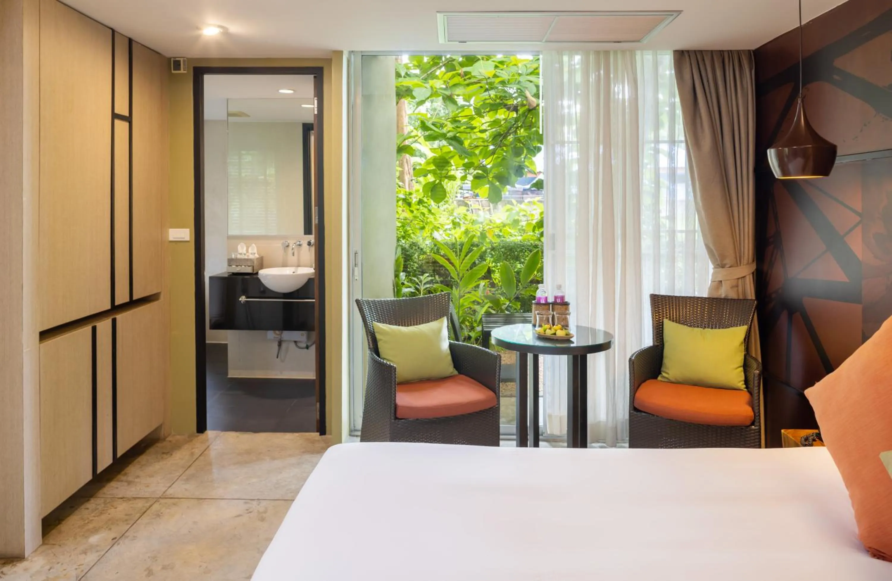 Seating area, Bed in U Inchantree Kanchanaburi