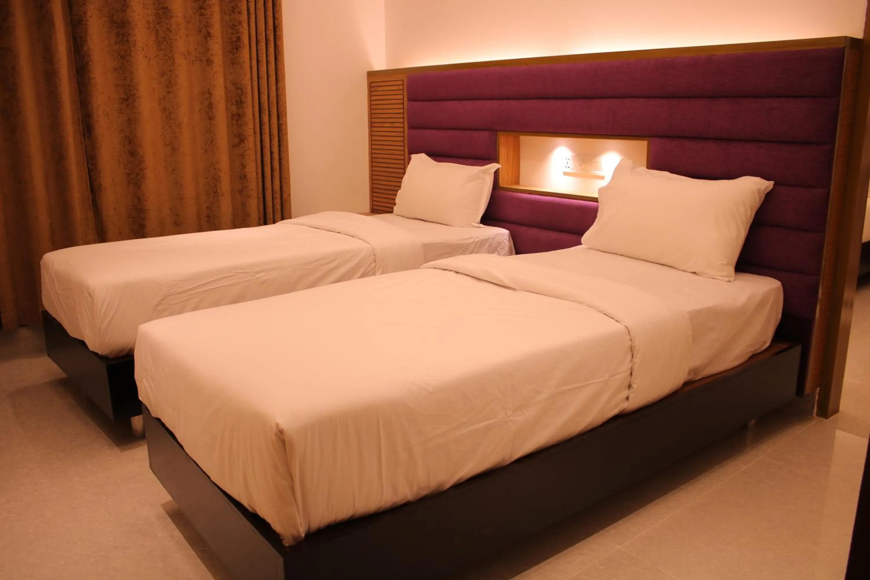 Bed in La Vista Hotel
