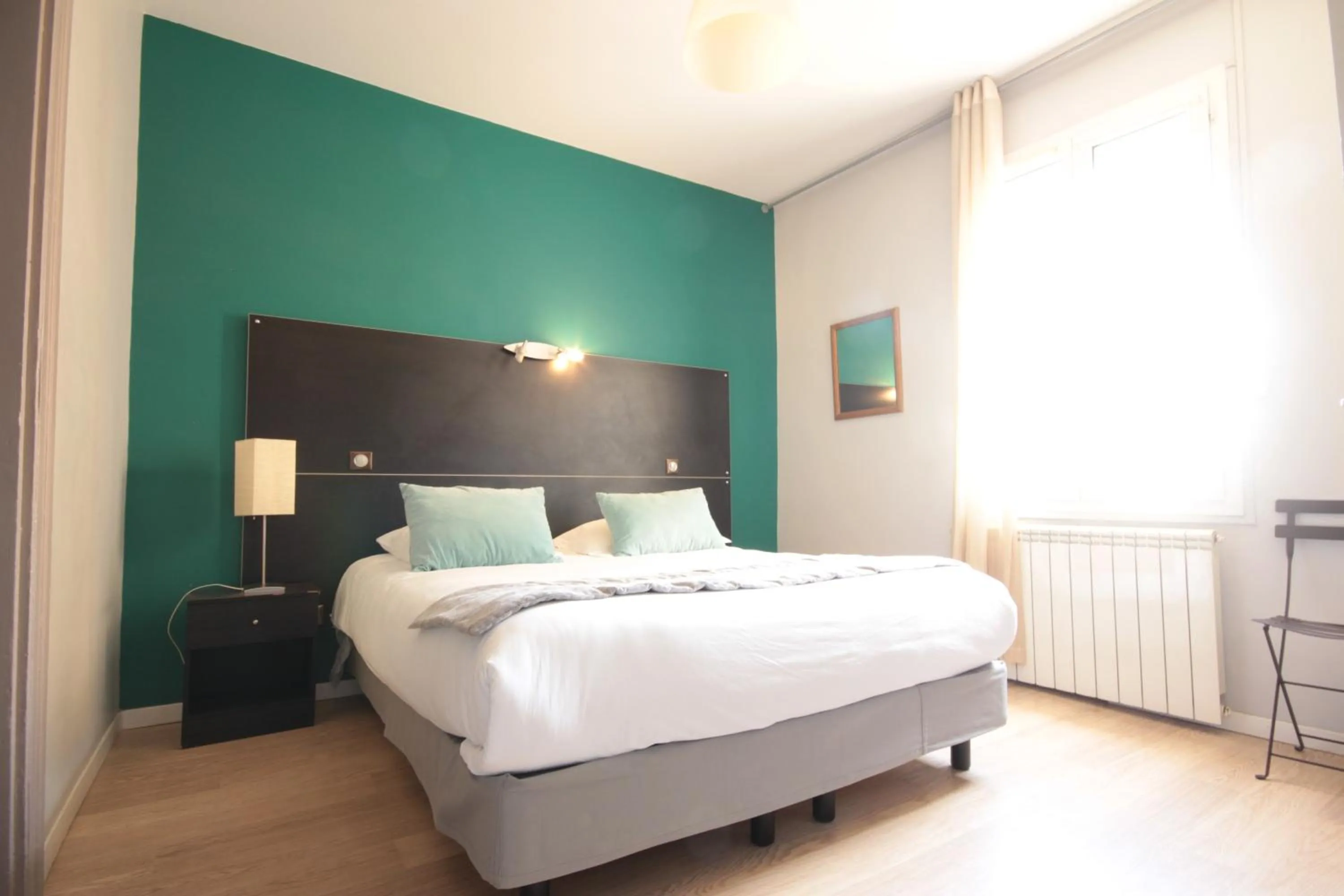 Bed in Hôtel Des Arts, Artisanal et Indépendant