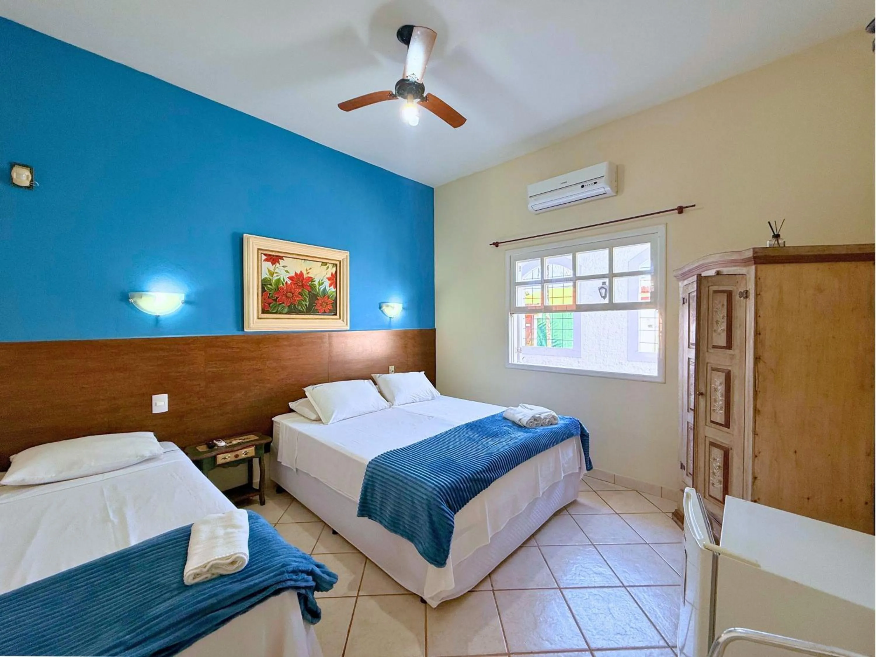 Bed in Pousada Larissa - com Gerador de Energia