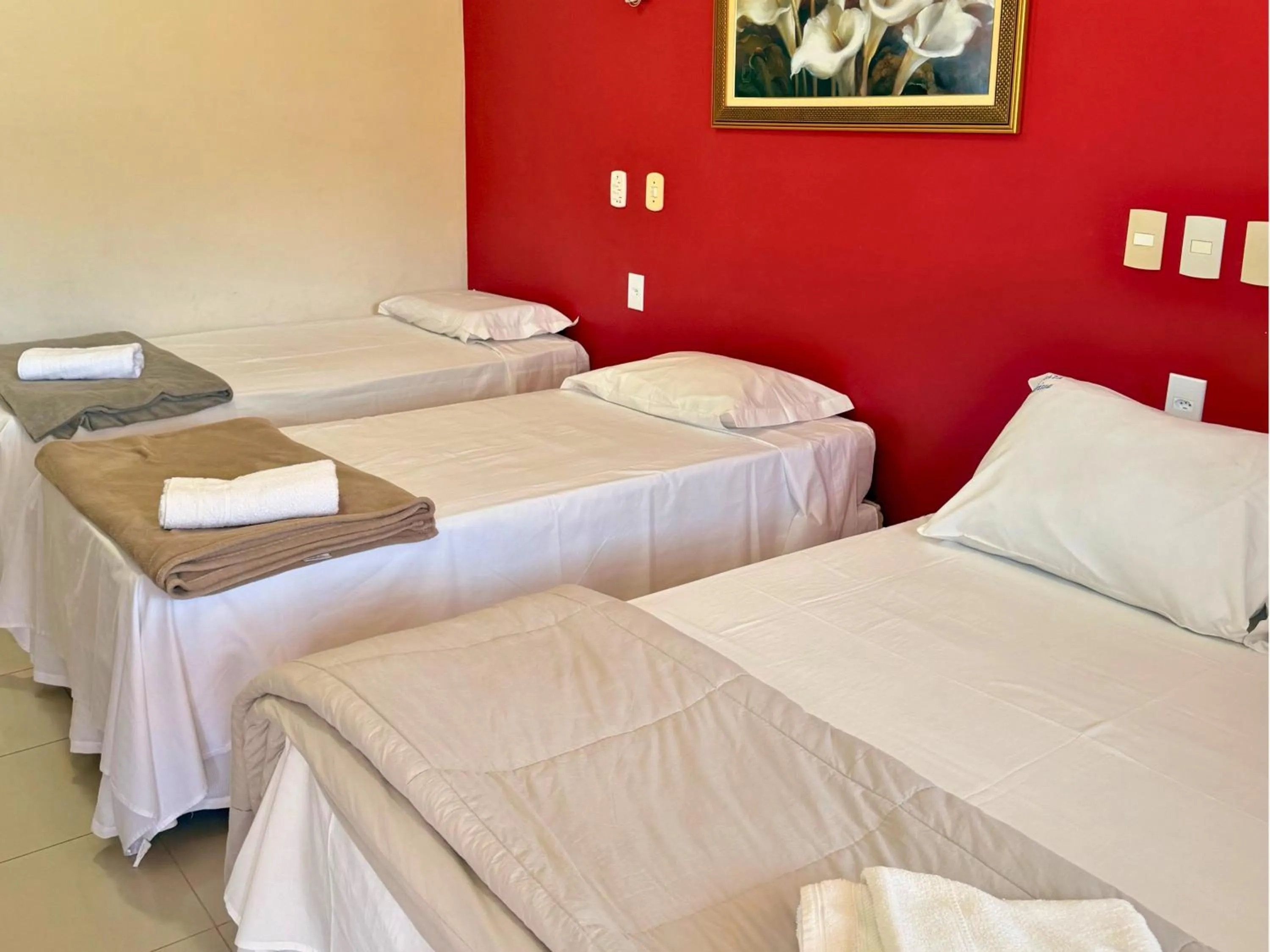 Bed in Pousada Larissa - com Gerador de Energia