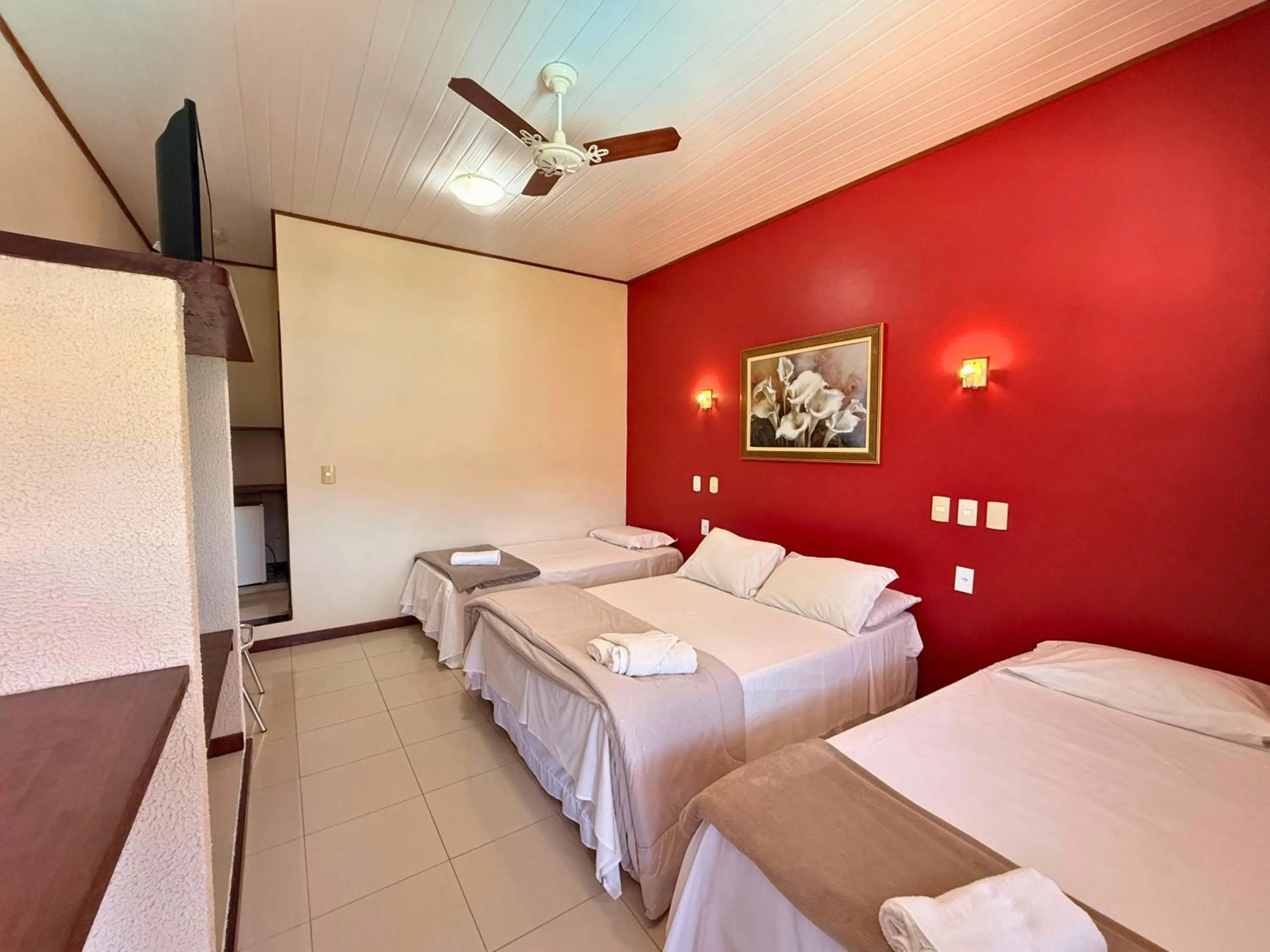 Bed in Pousada Larissa - com Gerador de Energia