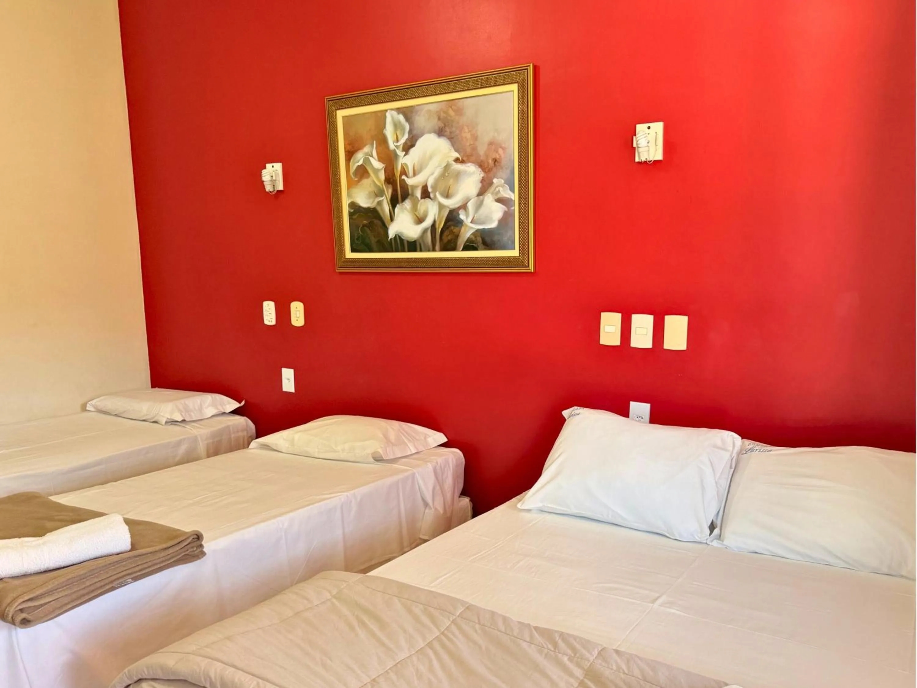 Bed in Pousada Larissa - com Gerador de Energia