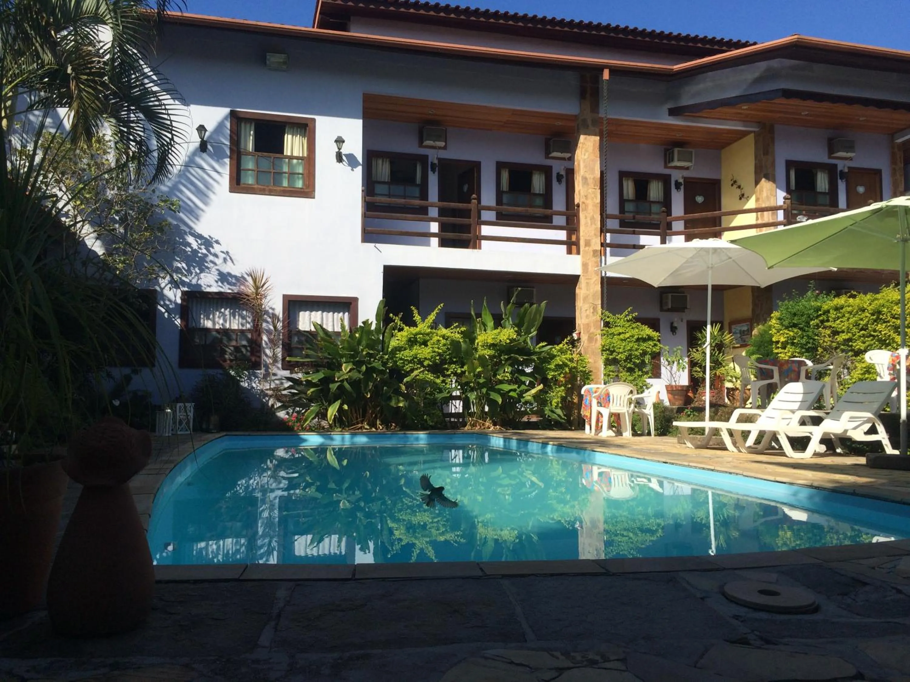 Swimming pool in Pousada Larissa - com Gerador de Energia