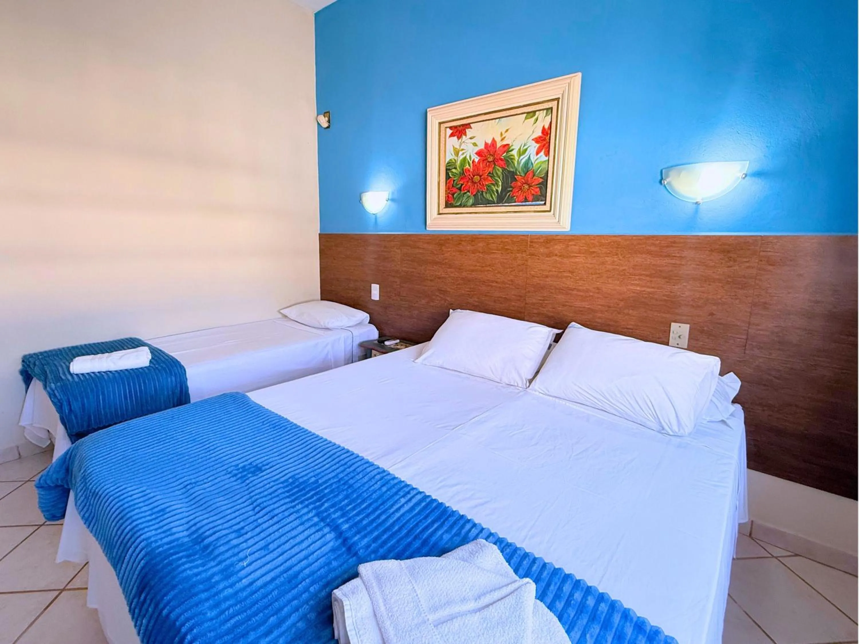 Bed in Pousada Larissa - com Gerador de Energia