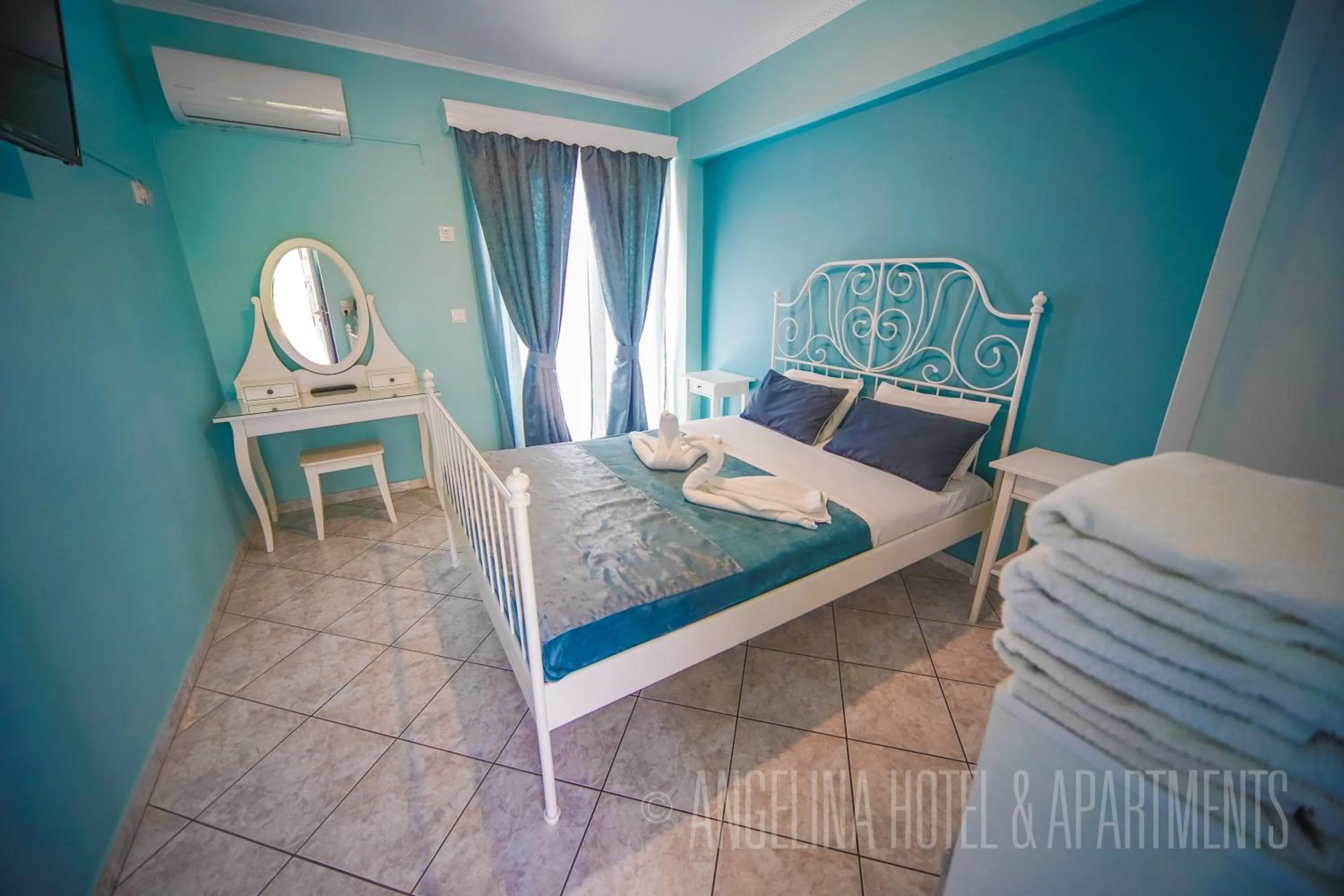 Bedroom, Bed in Angelina Hotel & Apartments