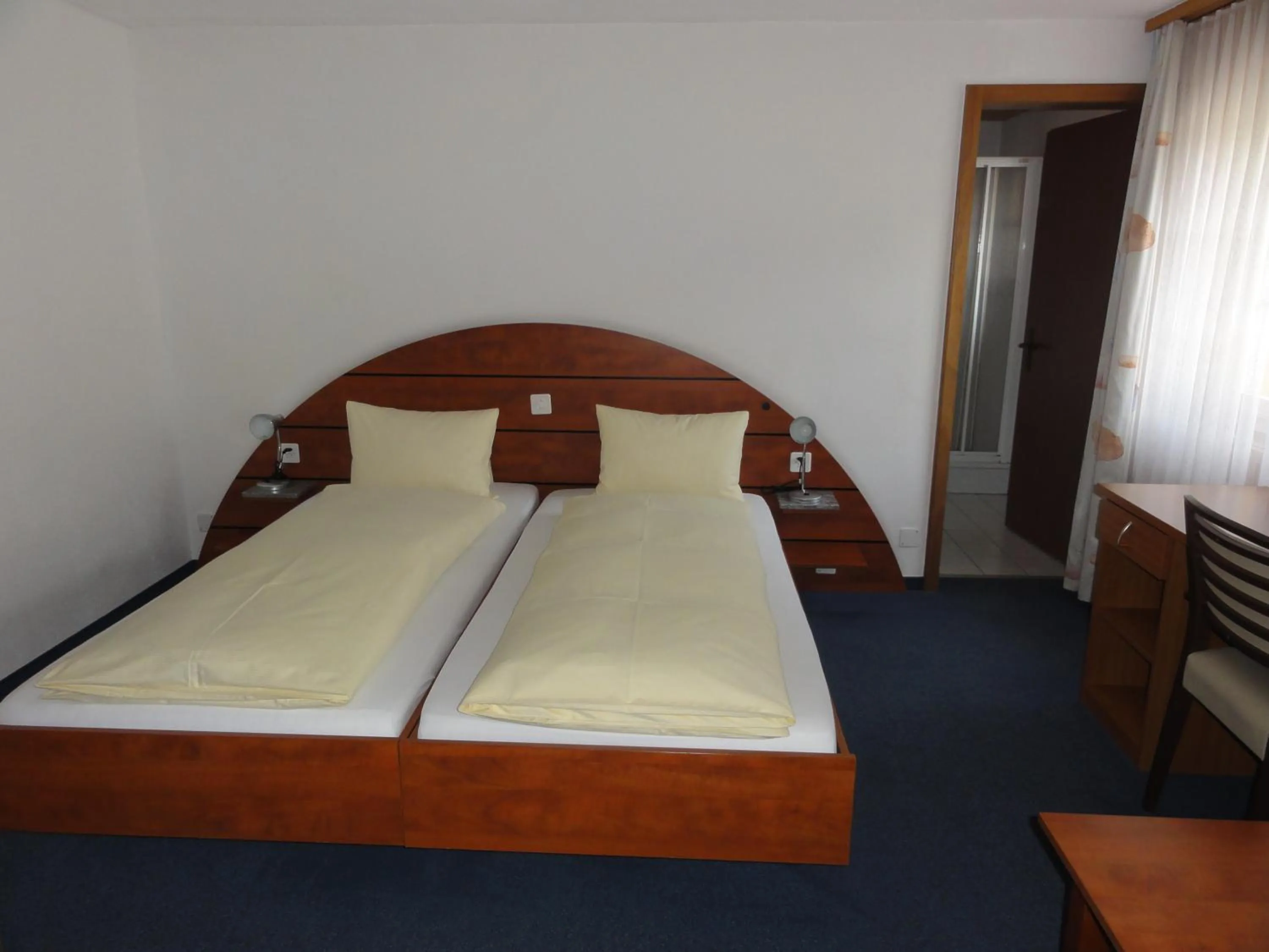 Bed in Hotel Steinbock Grindelwald