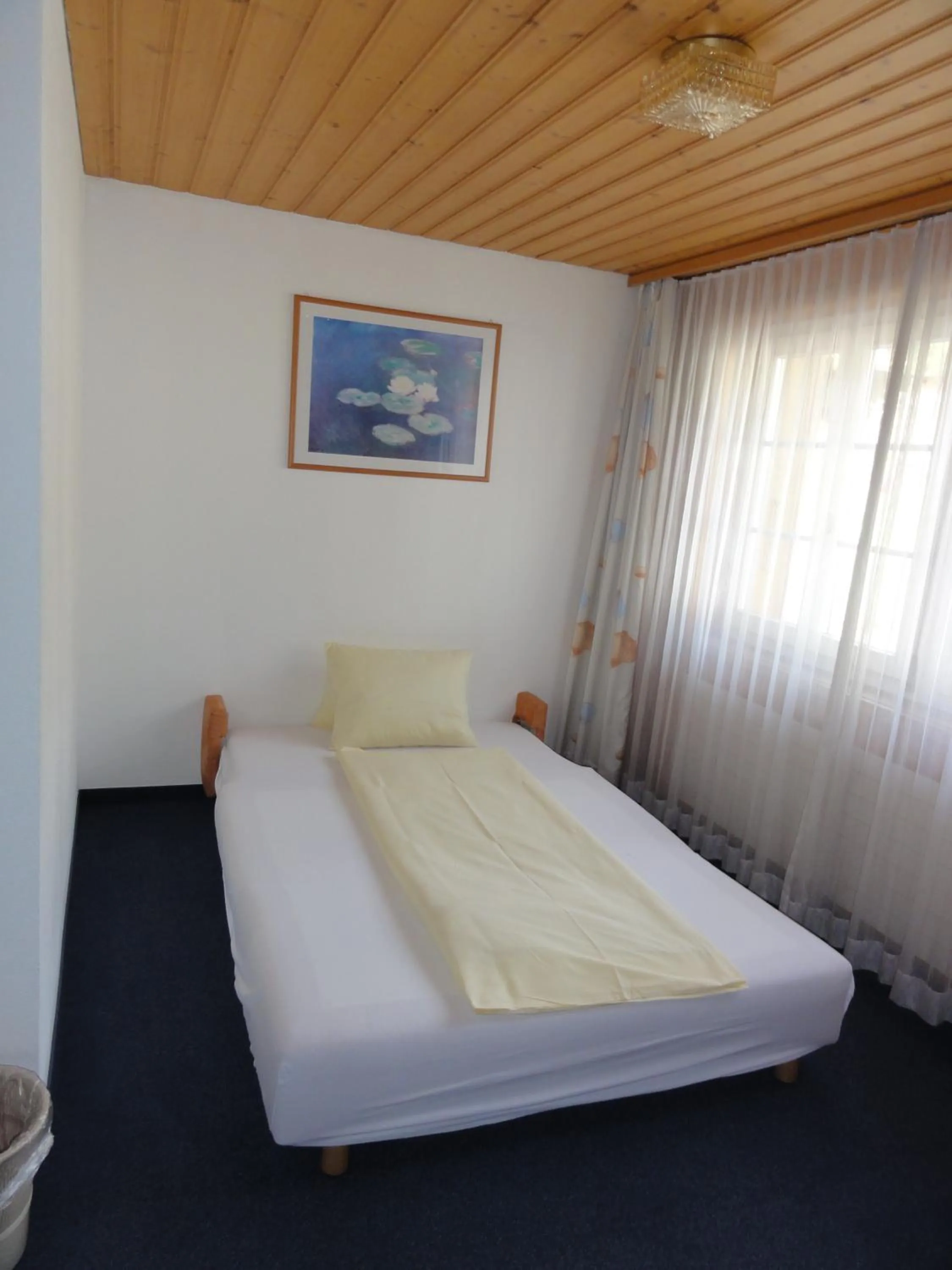 Bed in Hotel Steinbock Grindelwald