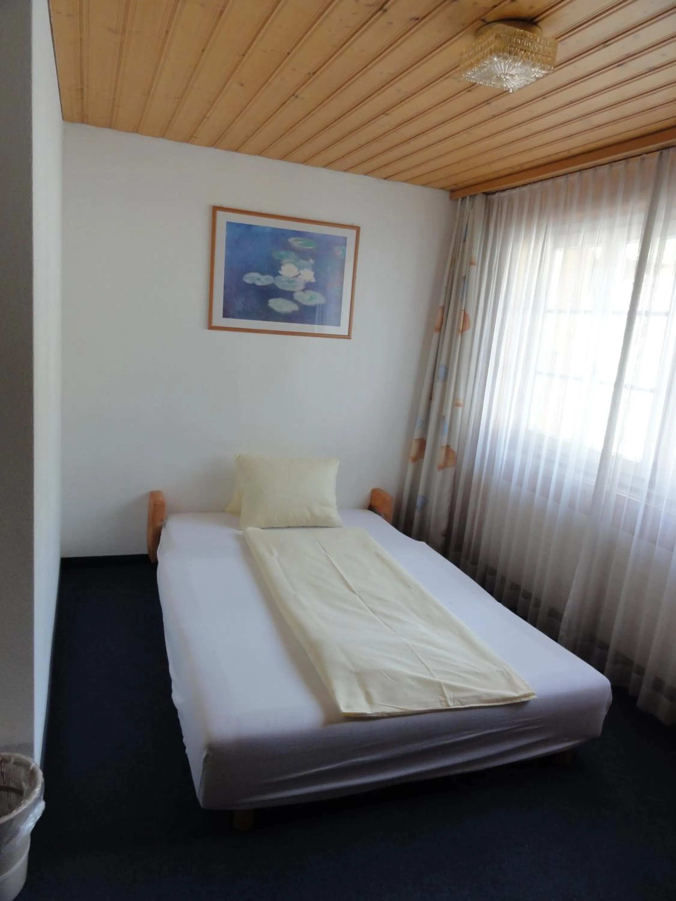 Bed in Hotel Steinbock Grindelwald