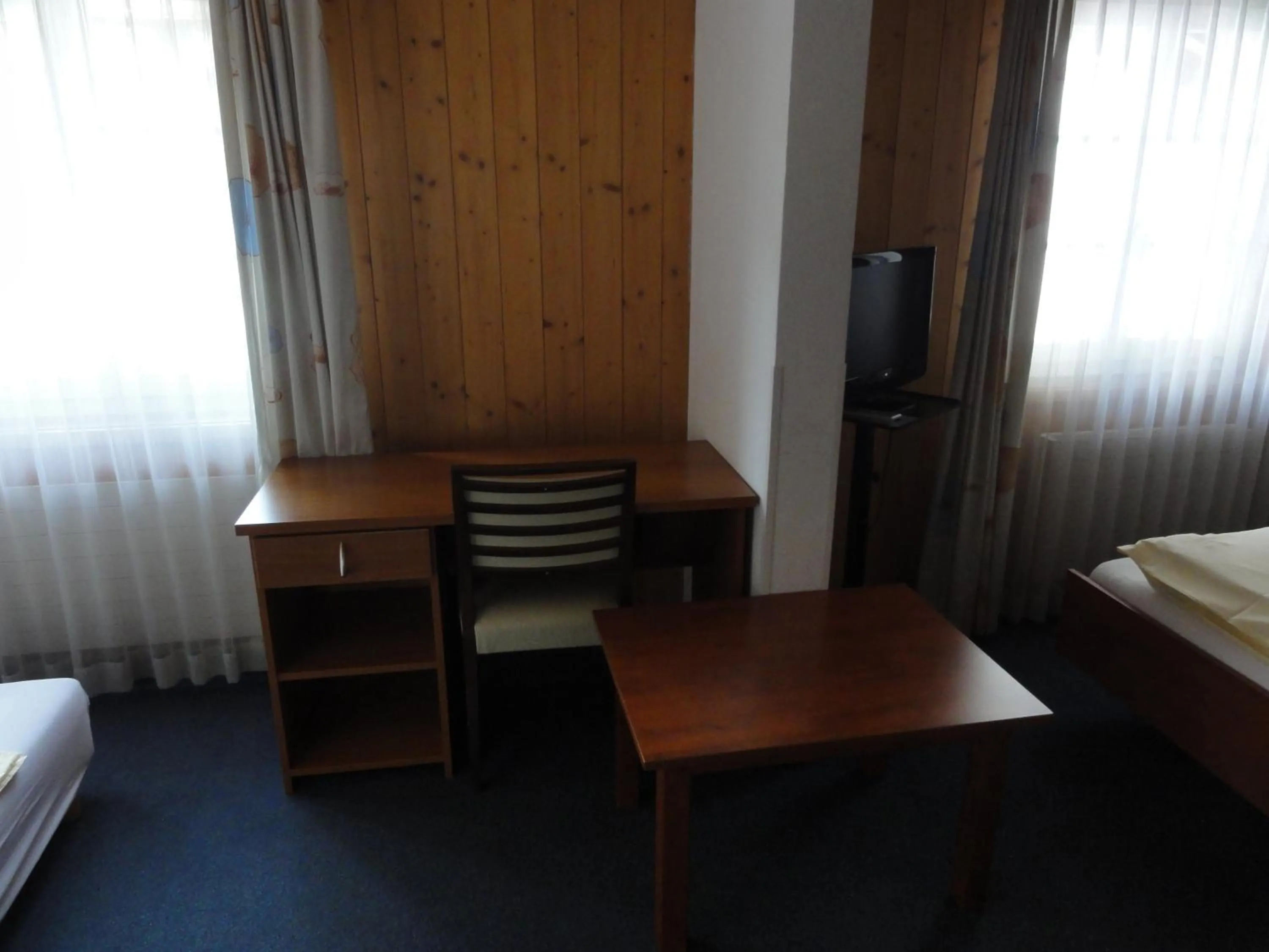 Bed in Hotel Steinbock Grindelwald