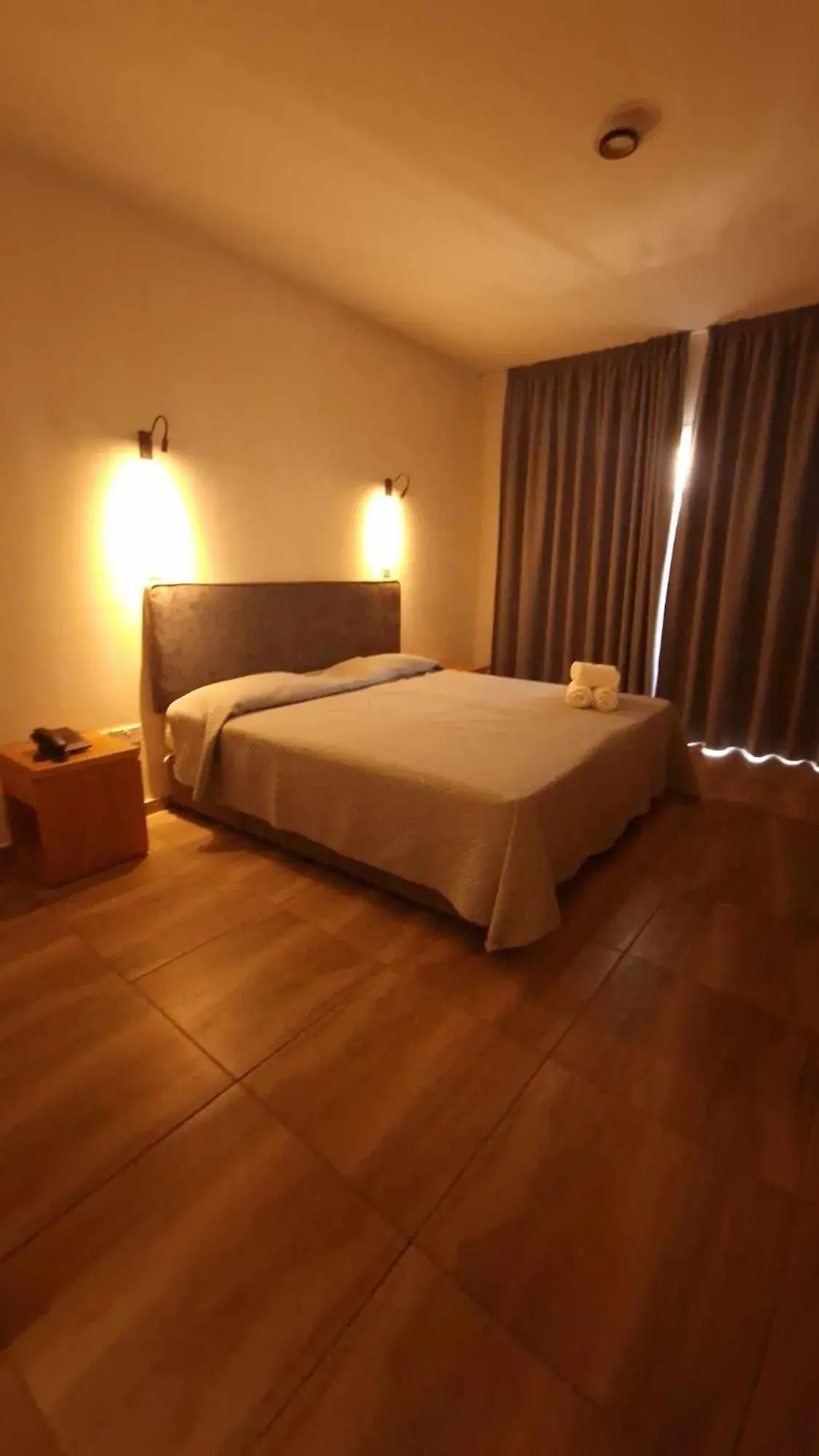 Bed in M. Moniatis Hotel Bed in M. Moniatis Hotel