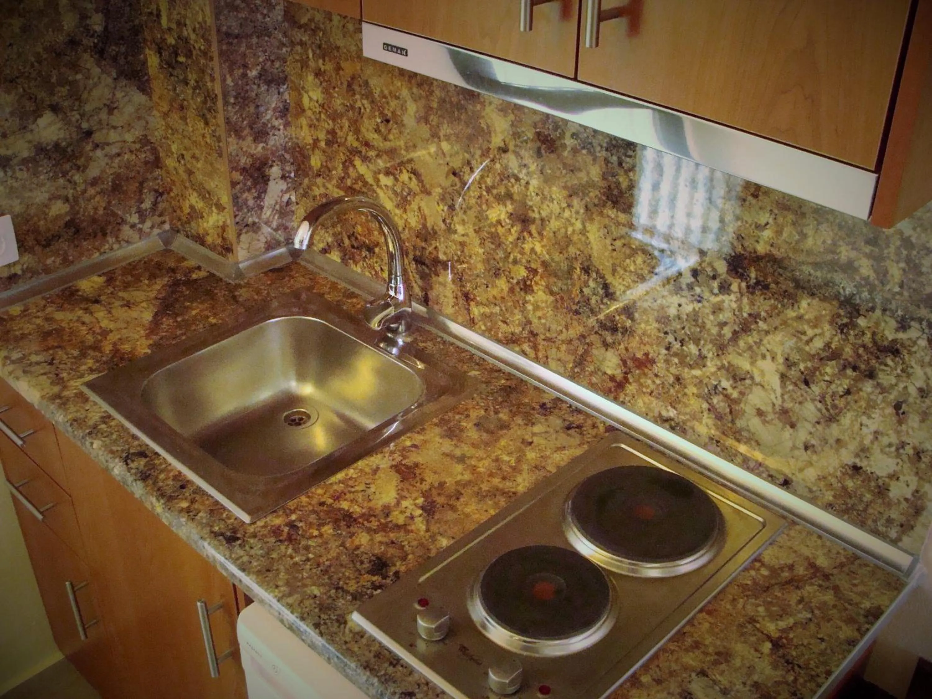 Kitchen or kitchenette in Toula's Apartments