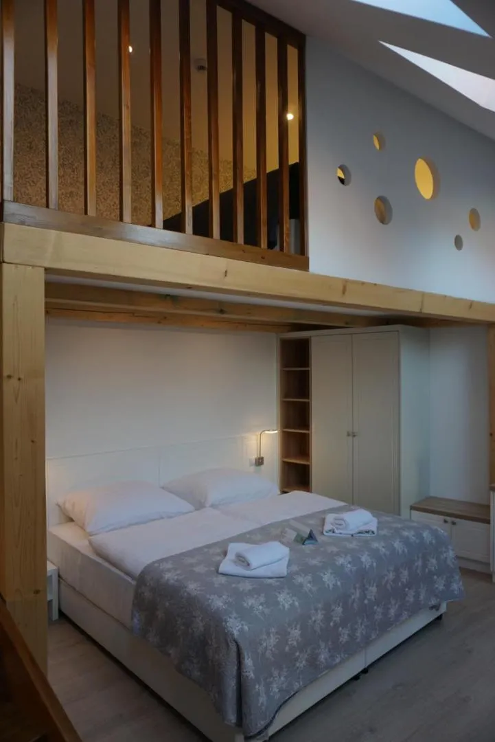 Photo of the whole room, Bed in Erhardt Panzió