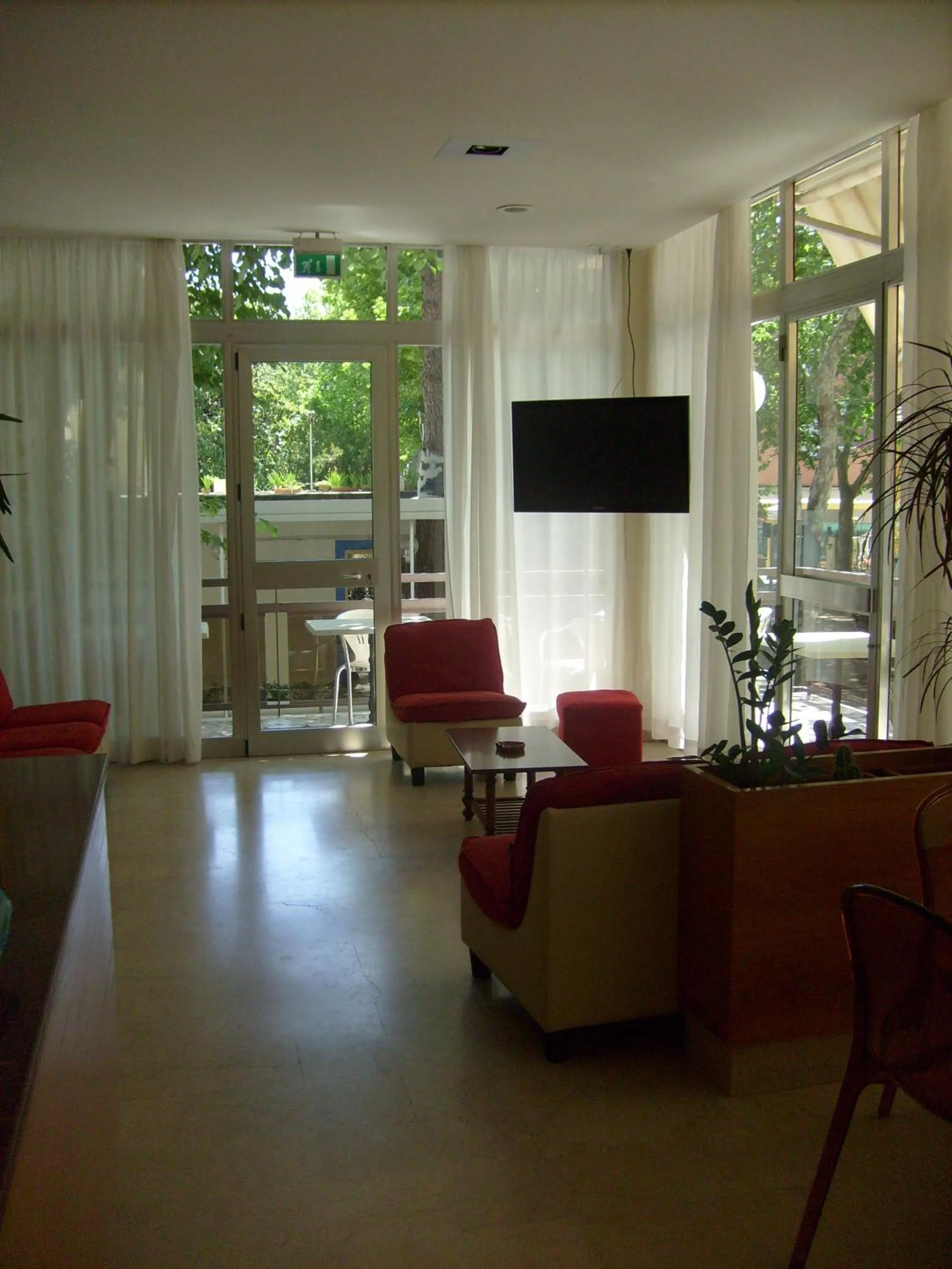 Communal lounge/ TV room in Hotel Tiziana