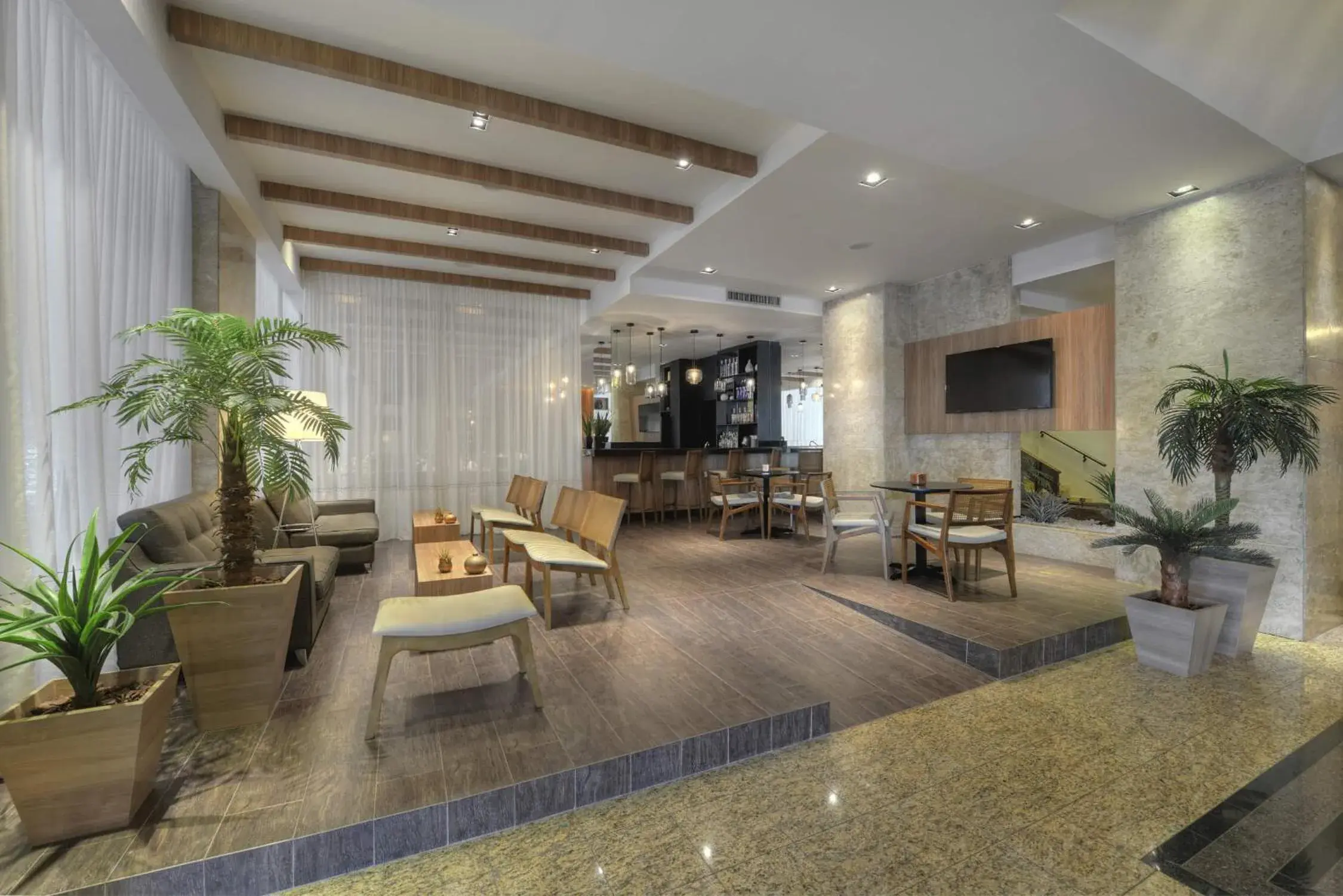 Living room in Hotel Deville Business Maringá Living room in Hotel Deville Business Maringá