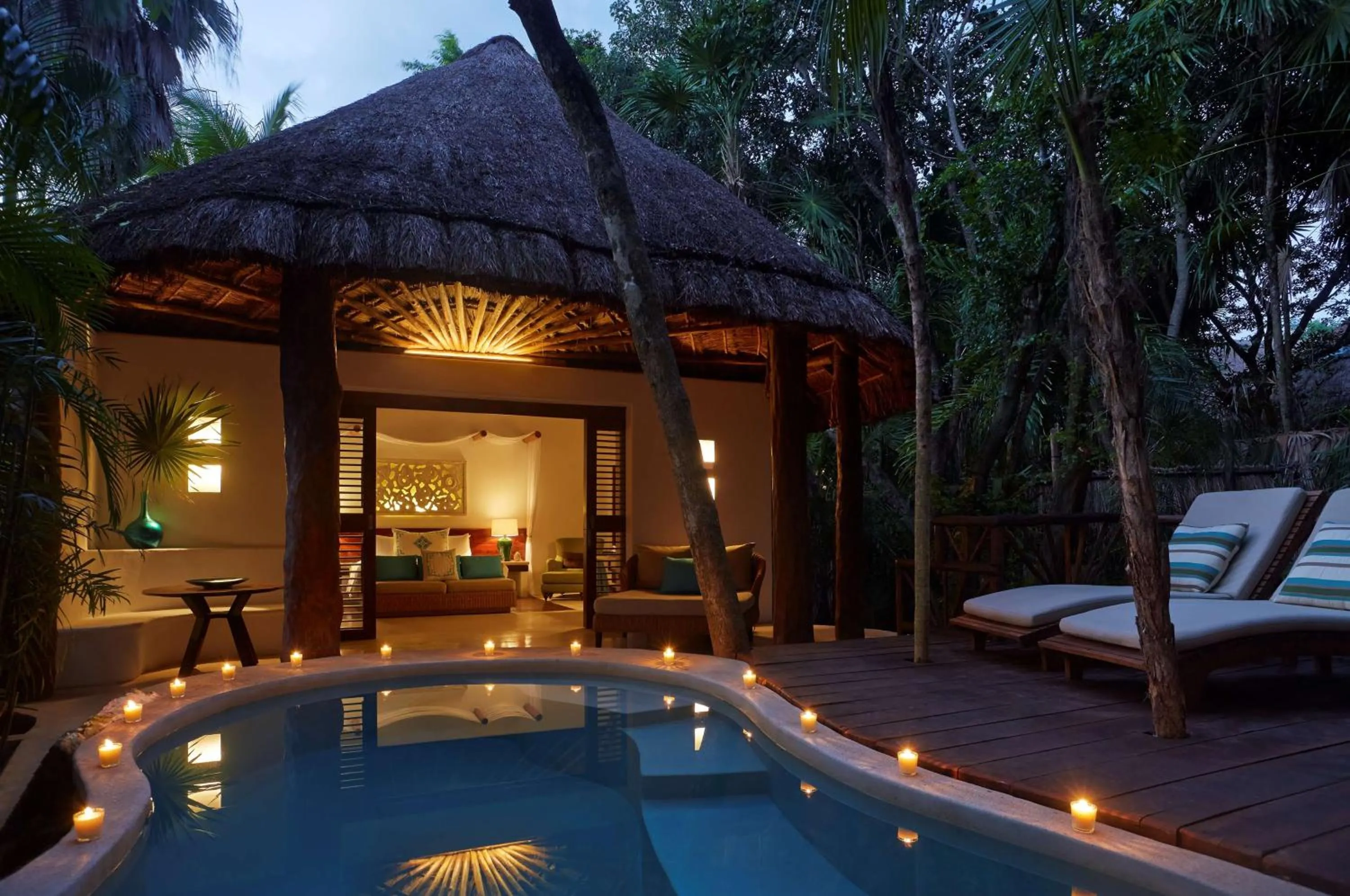 Swimming pool in Viceroy Riviera Maya, a Luxury Villa Resort