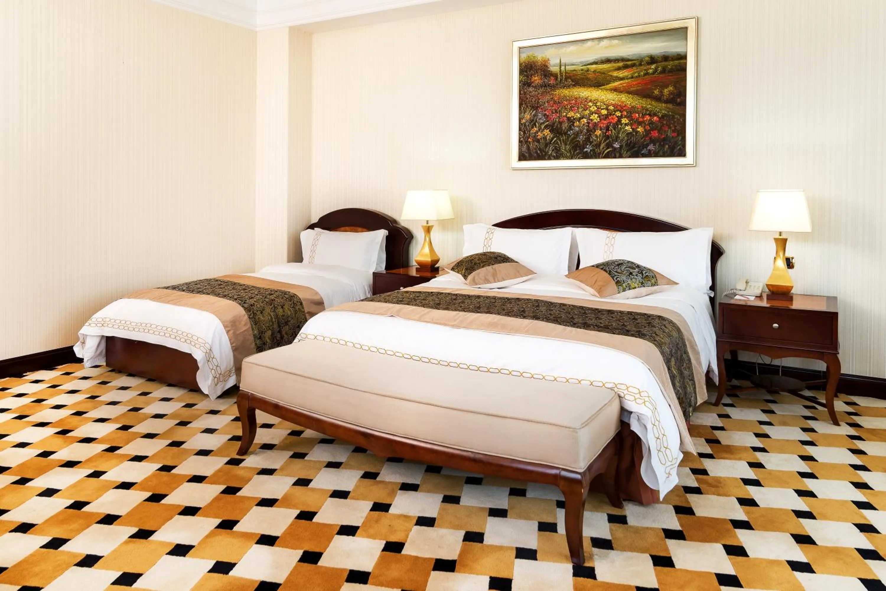 Bed in Royal Tulip Almaty Hotel