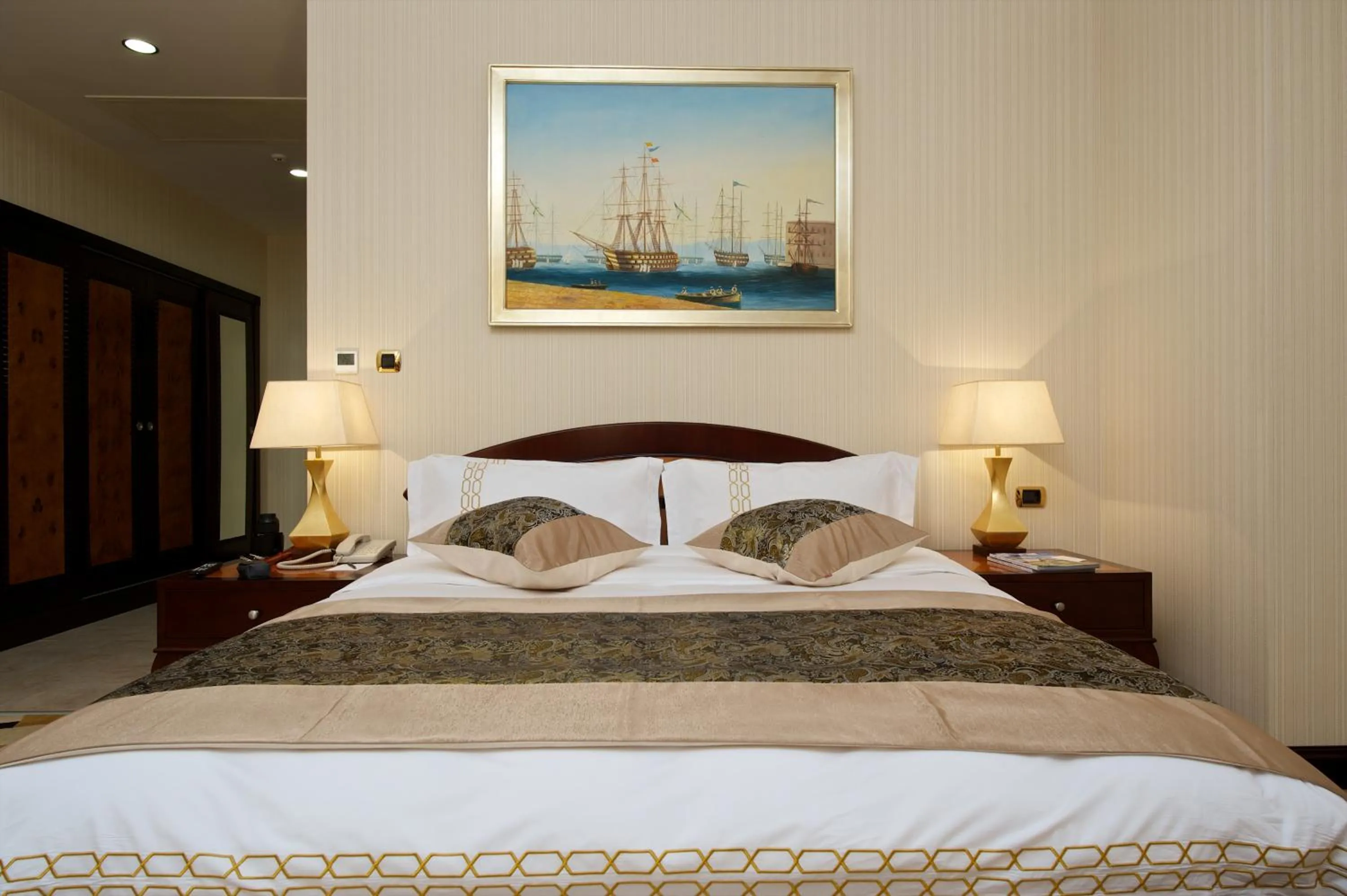 Bed in Royal Tulip Almaty Hotel