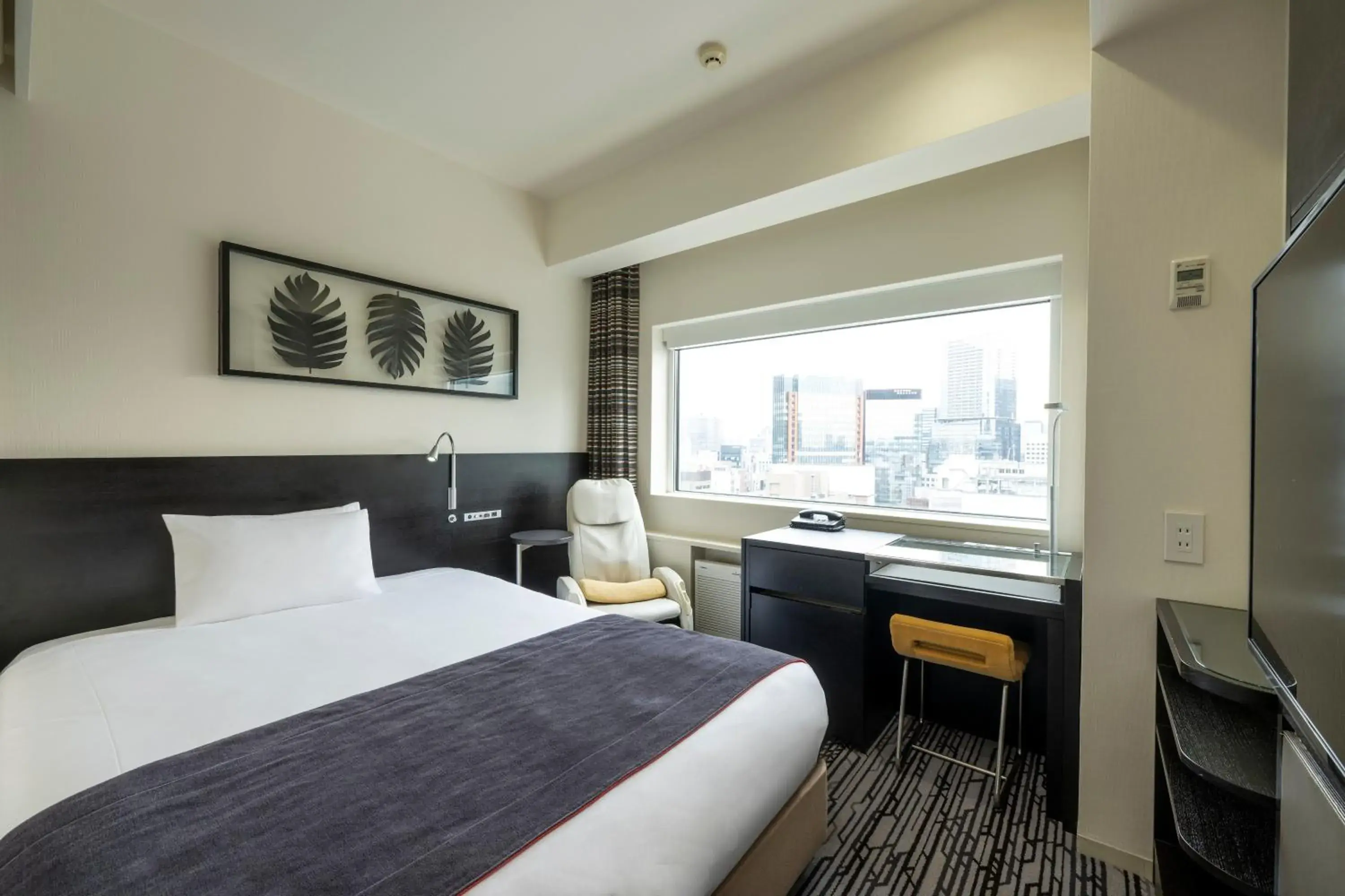 Photo of the whole room, Bed in remm Akihabara Photo of the whole room, Bed in remm Akihabara