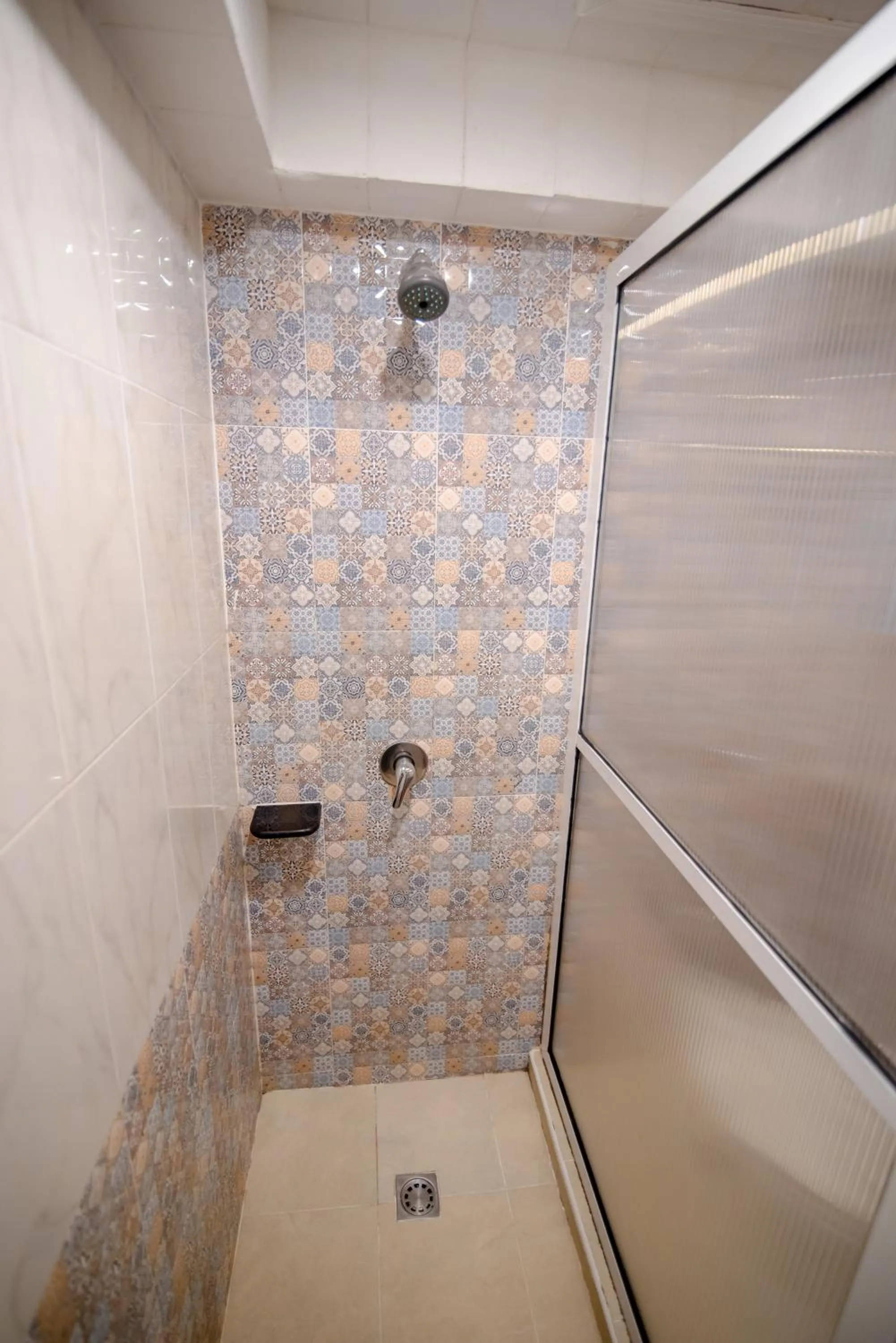 Bathroom in New Travel Beach Hotel & Resort