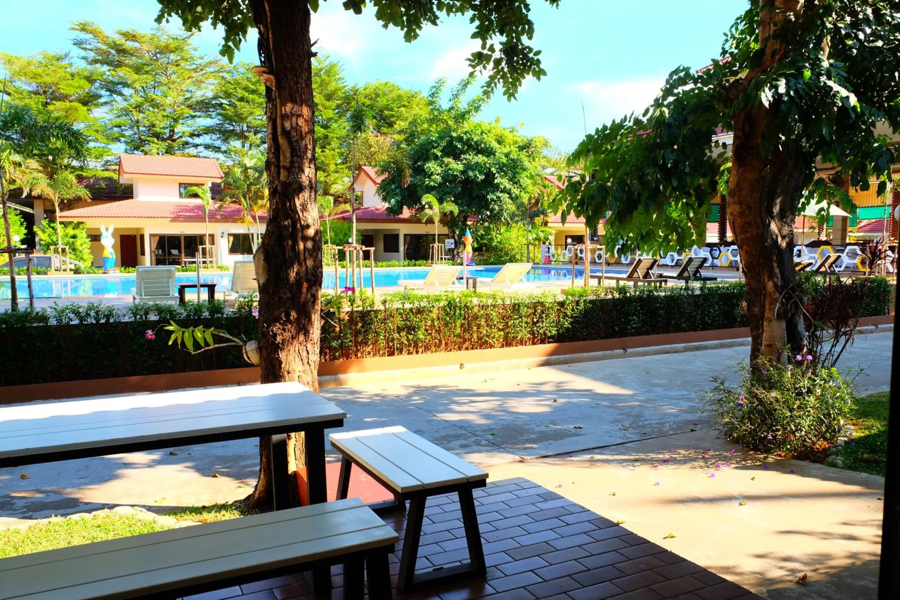 Patio in New Travel Beach Hotel & Resort