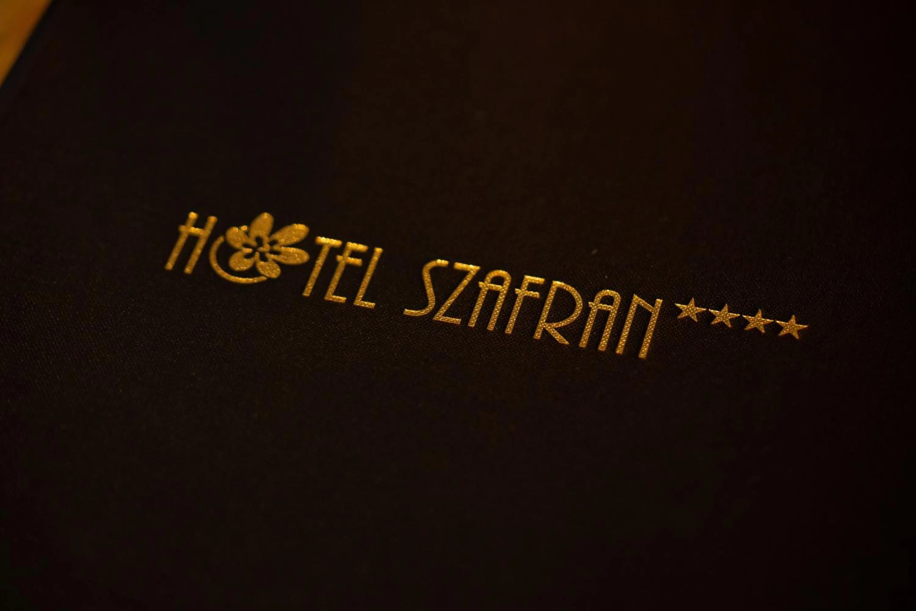 Logo/Certificate/Sign in Hotel Szafran