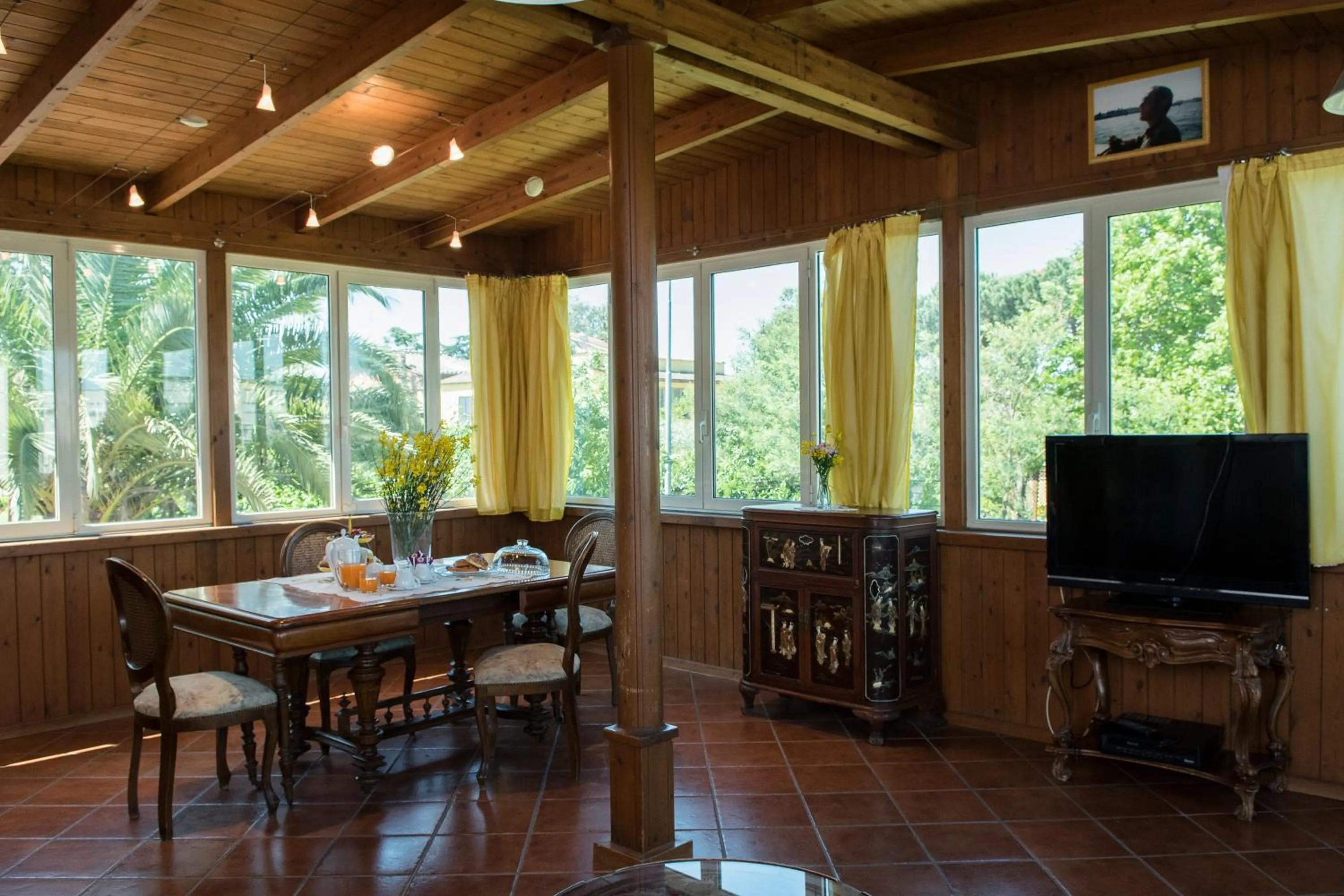 Communal lounge/ TV room in B&B Le Cinque Querce