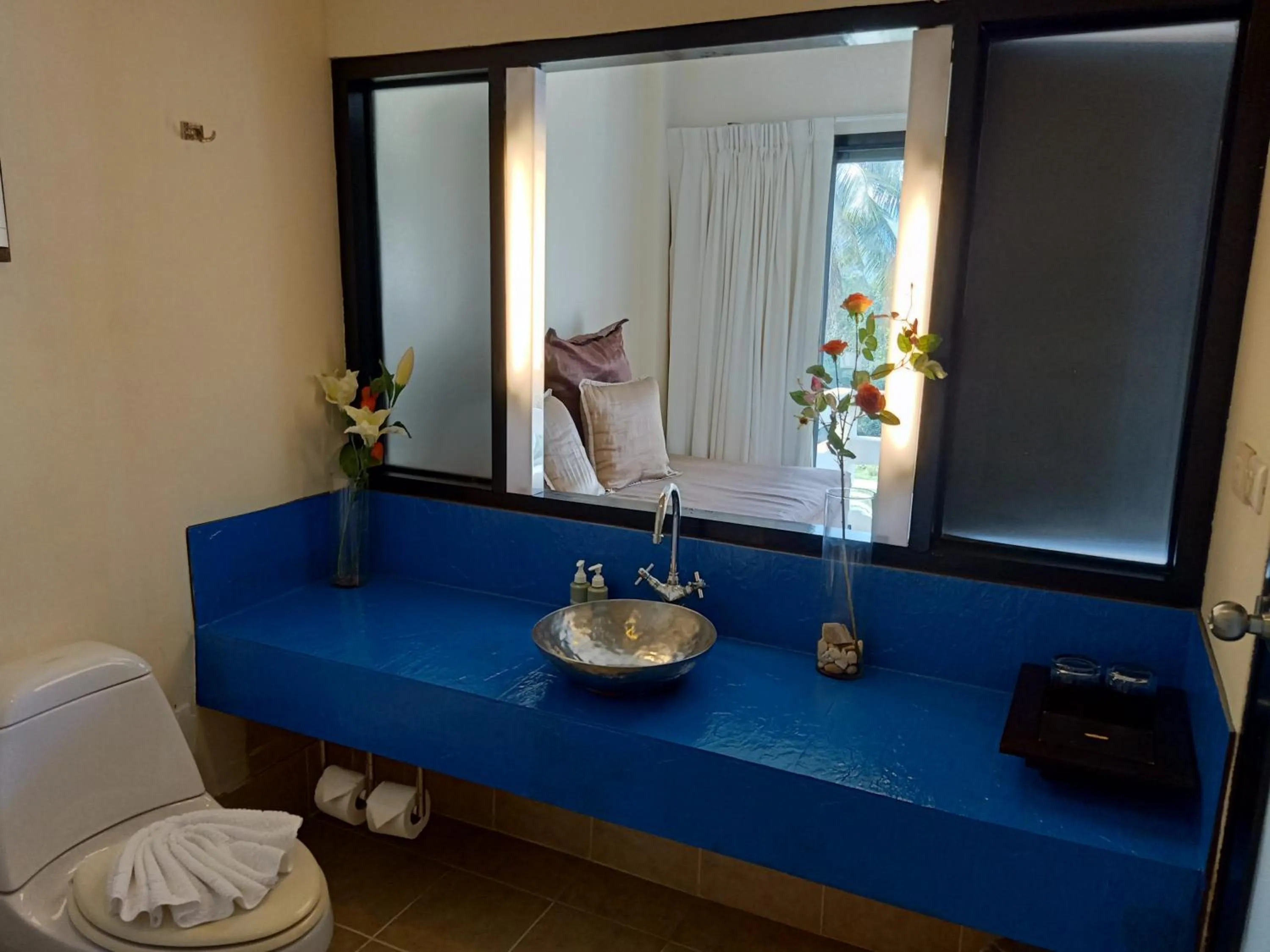 Bathroom in Amarin Samui Hotel - SHA Plus Certified