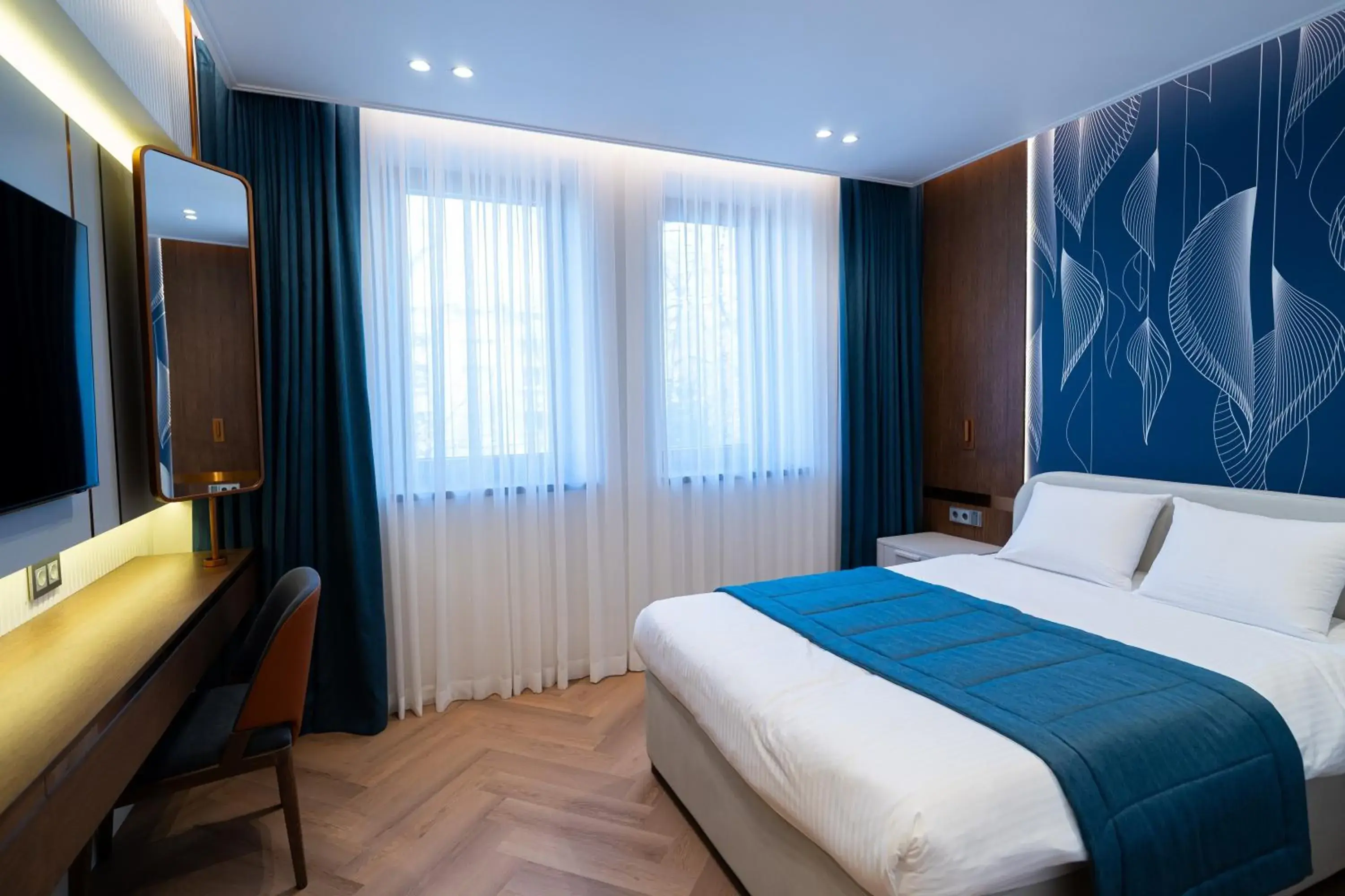 Bed in The Dostyk Hotel Bed in The Dostyk Hotel