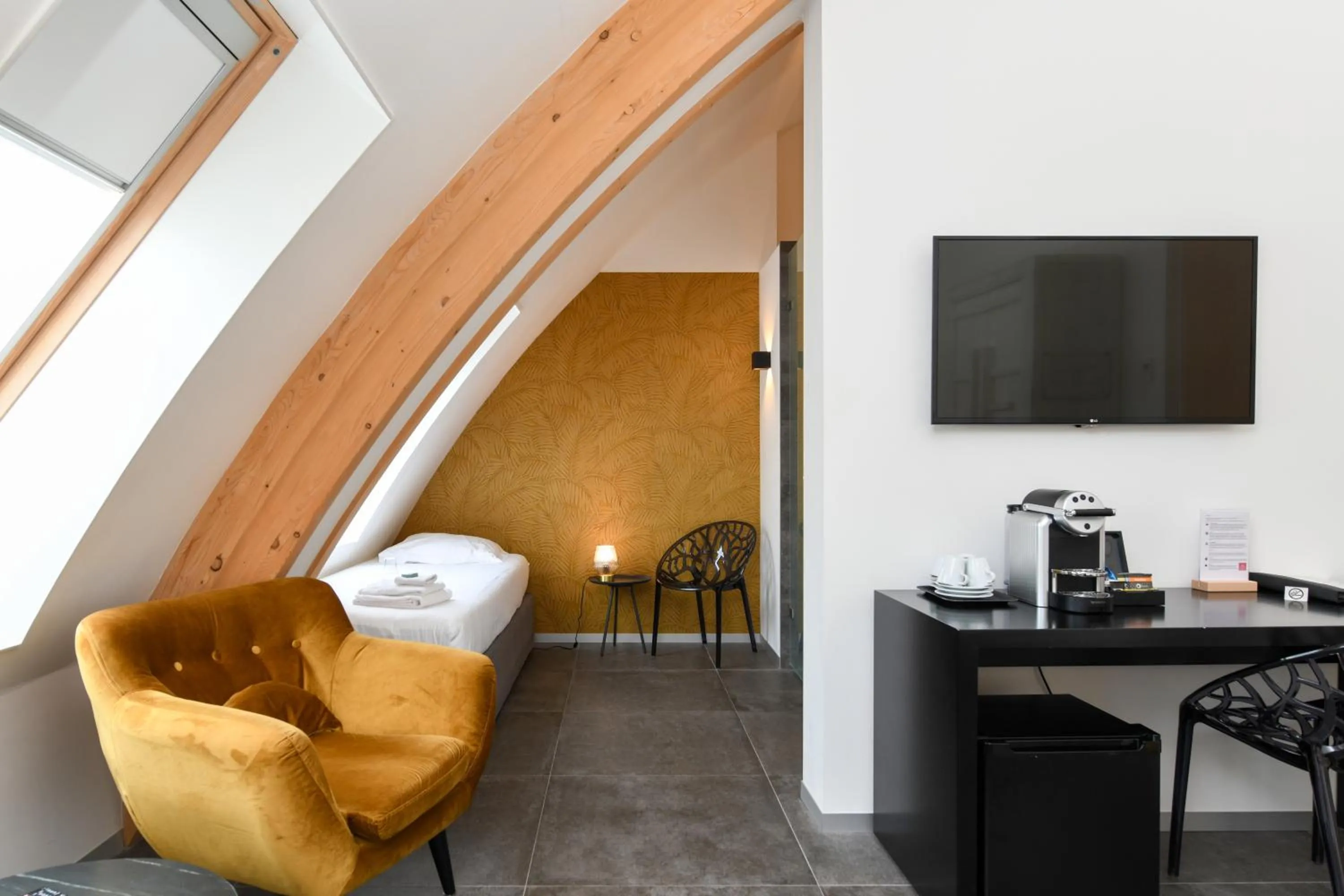 Bed in Hotel De Roode Schuur