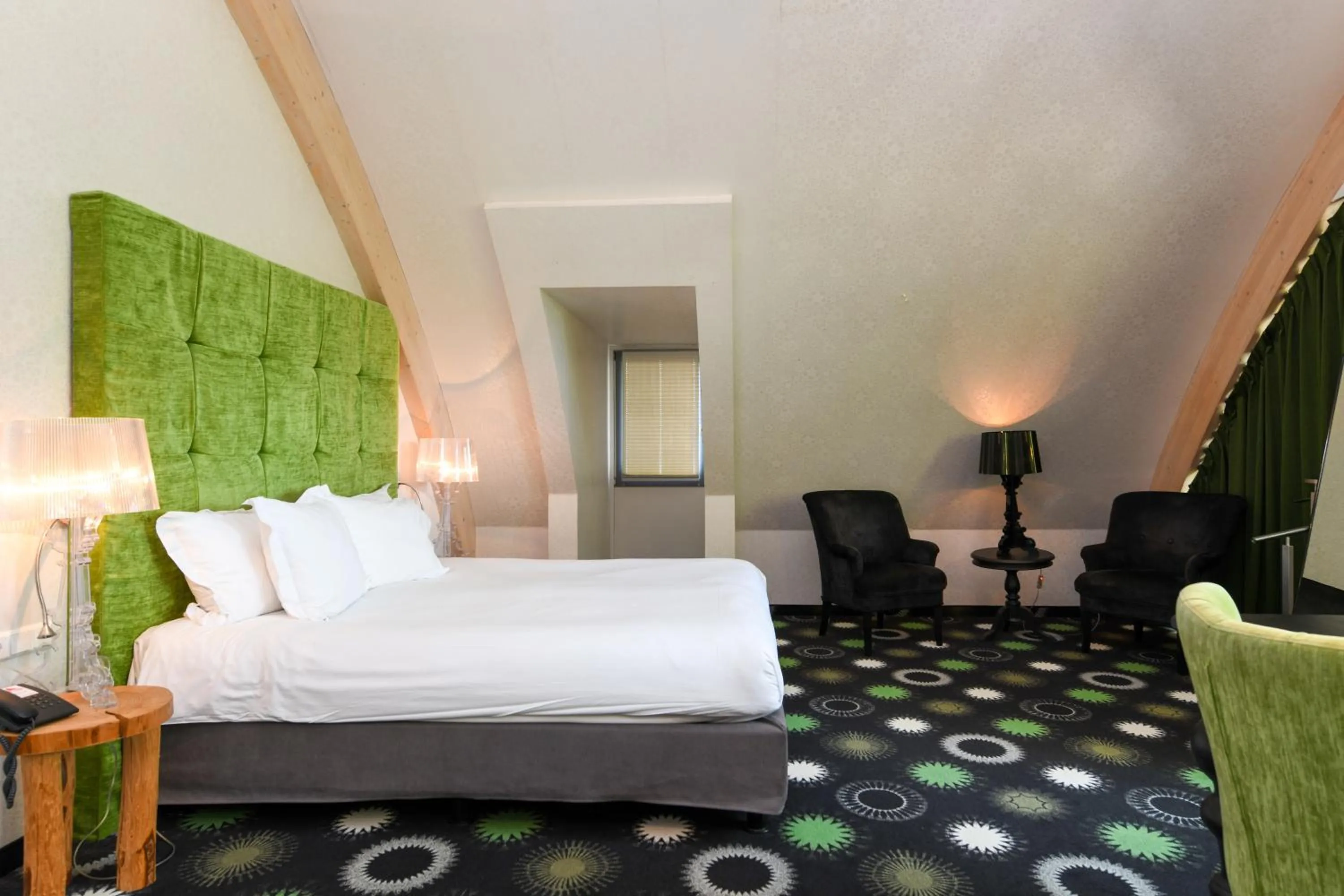 Bed in Hotel De Roode Schuur