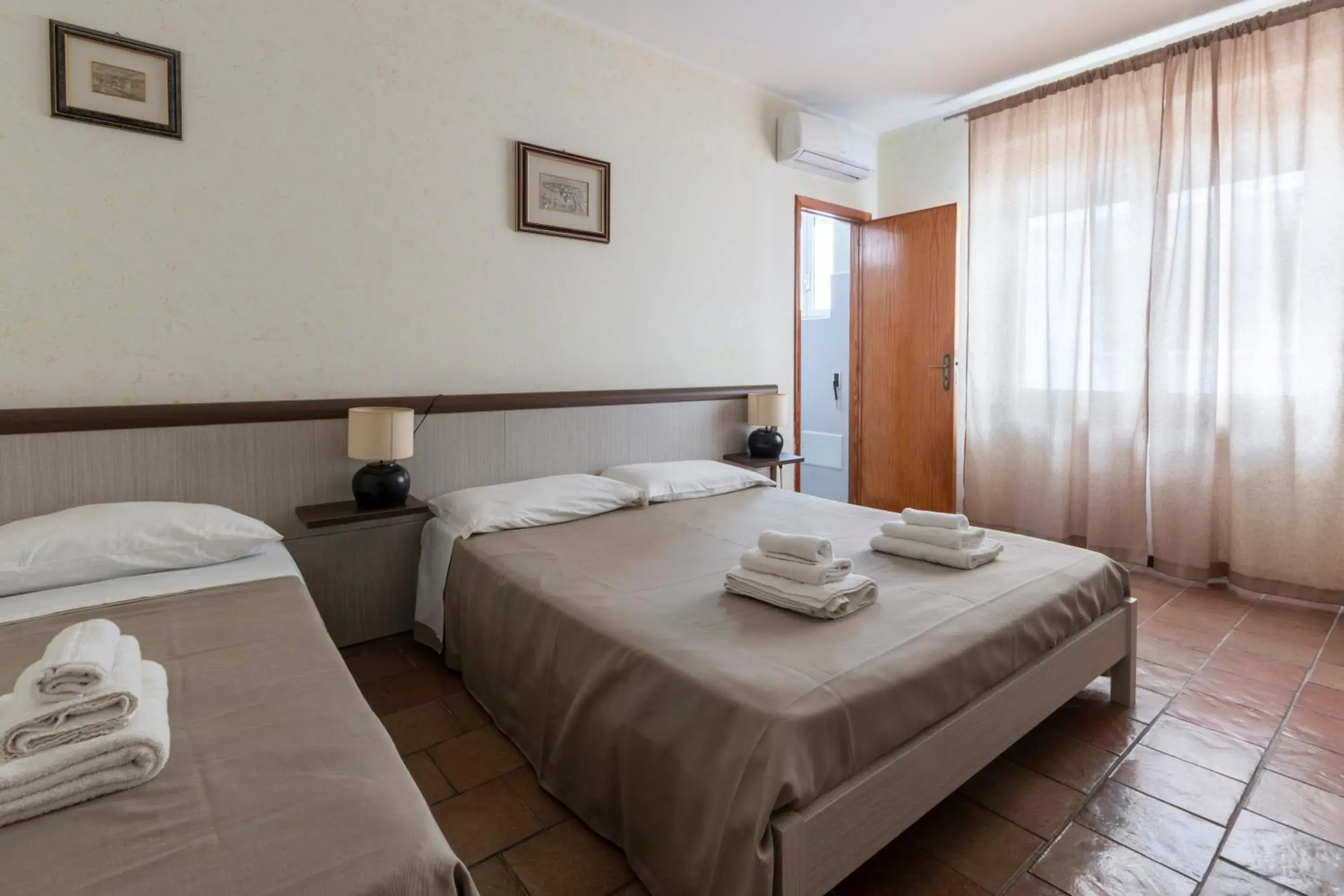 Triple Room in B&B Vittoria Triple Room in B&B Vittoria