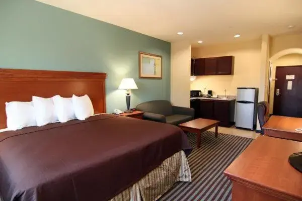 Bed in Executive Inn & Suites Bed in Executive Inn & Suites