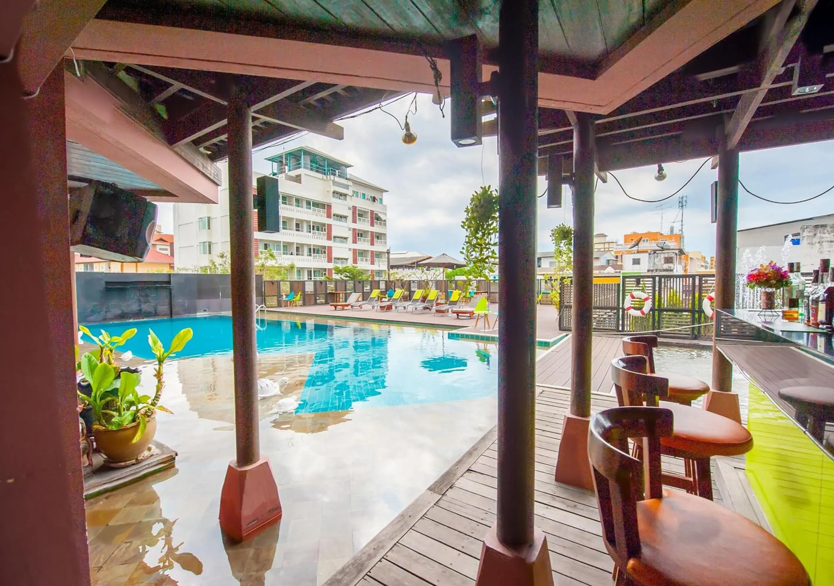Lounge or bar, Swimming Pool in The Seasons Pattaya - SHA Plus Certified