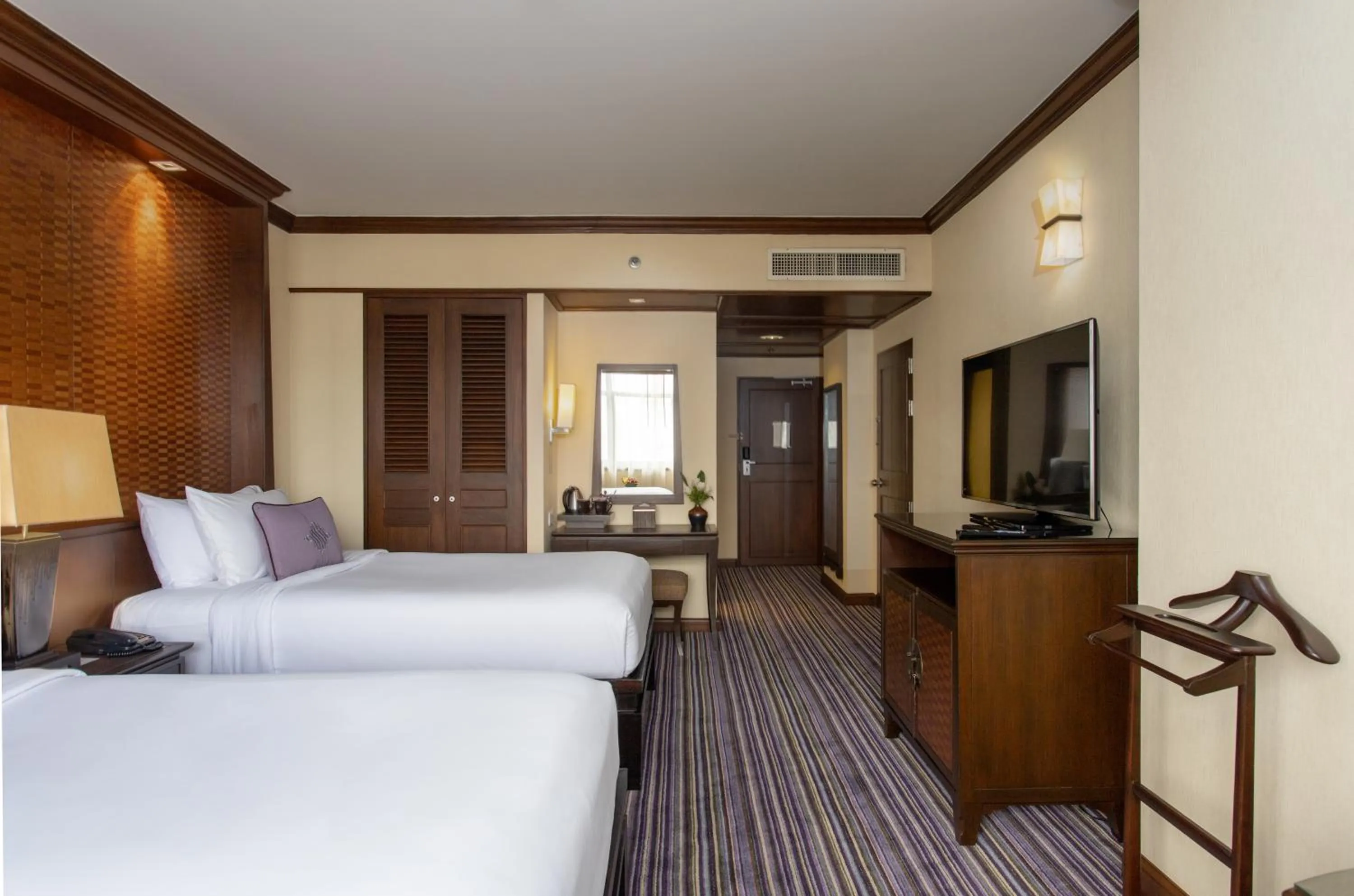 Bed in The Sukosol Hotel