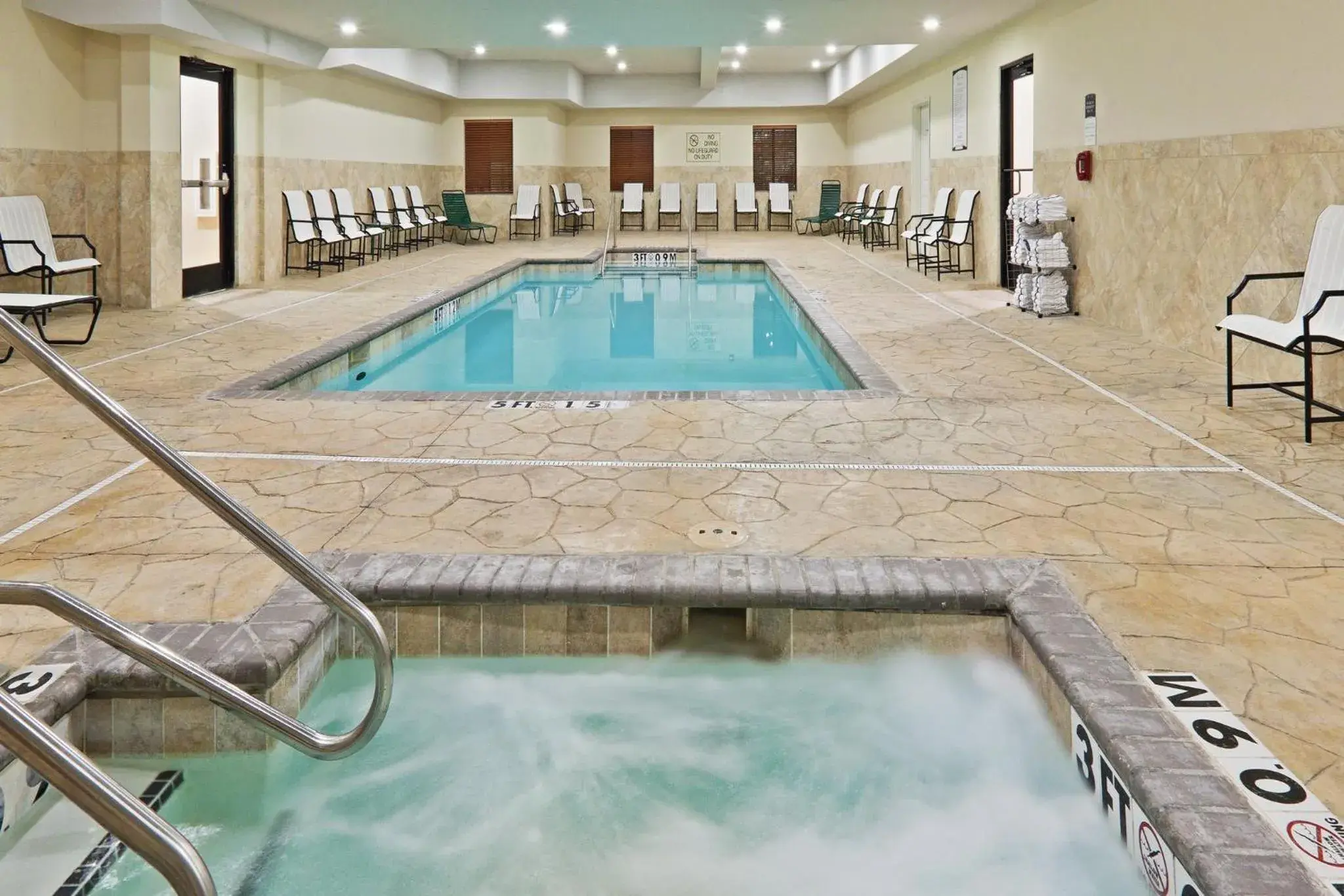 Swimming pool in Staybridge Suites Oklahoma City by IHG Swimming pool in Staybridge Suites Oklahoma City by IHG