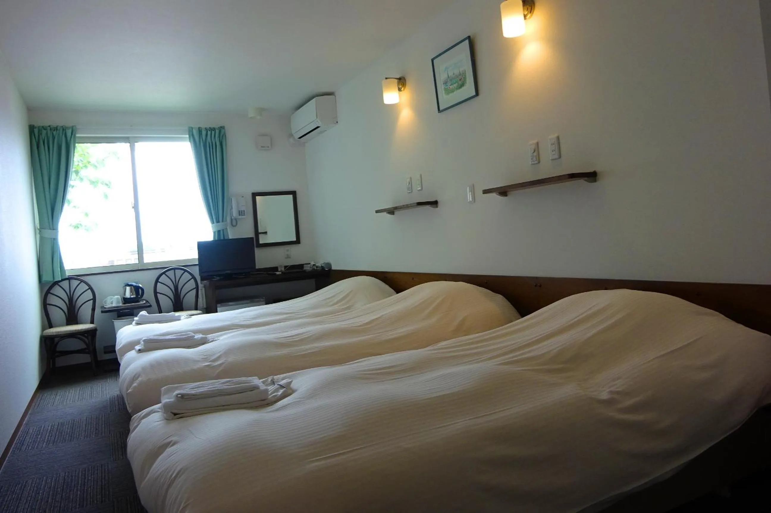 Bed in Hakodate Motomachi Hotel