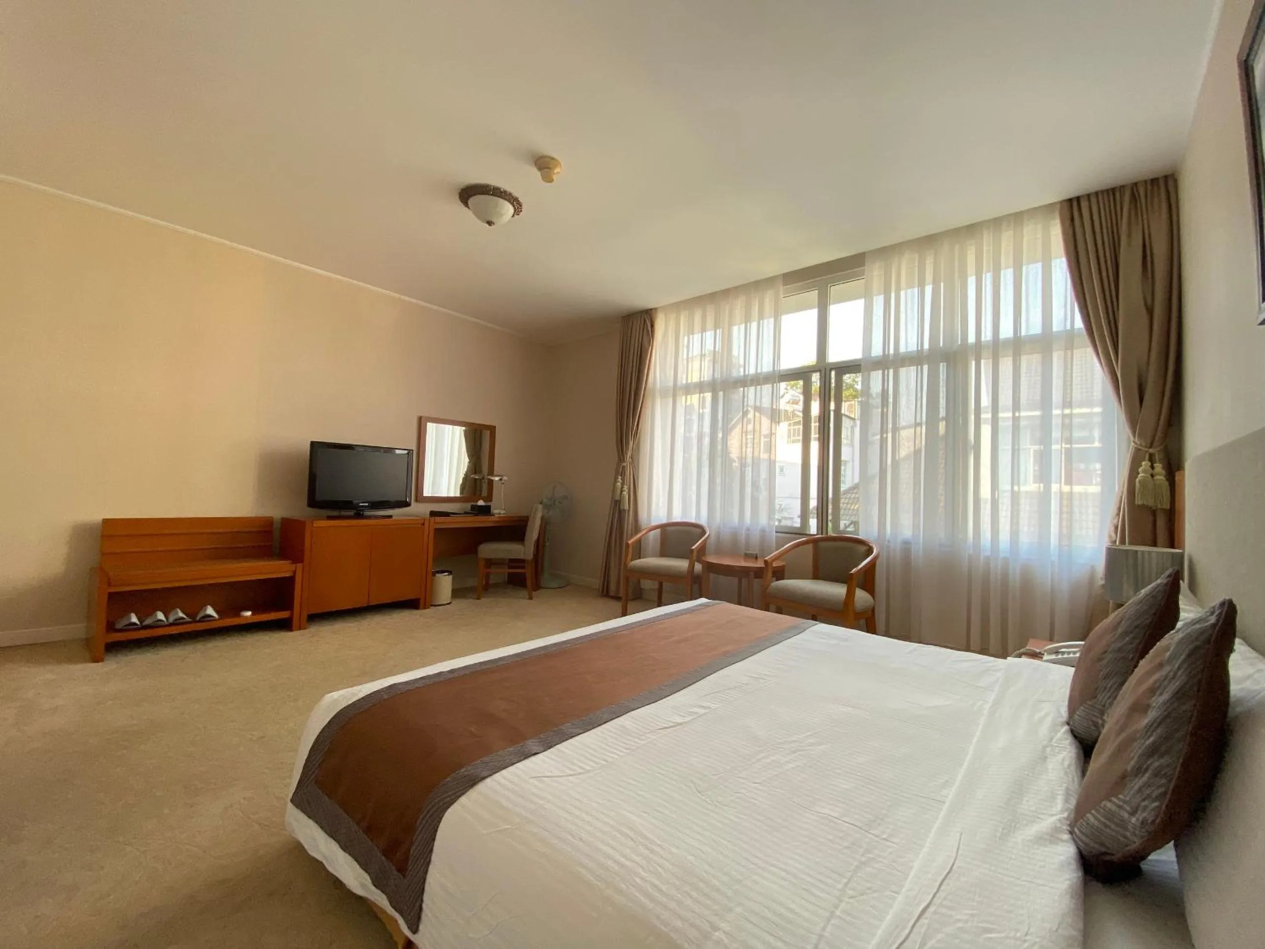 Bed in Muong Thanh Holiday Da Lat Hotel