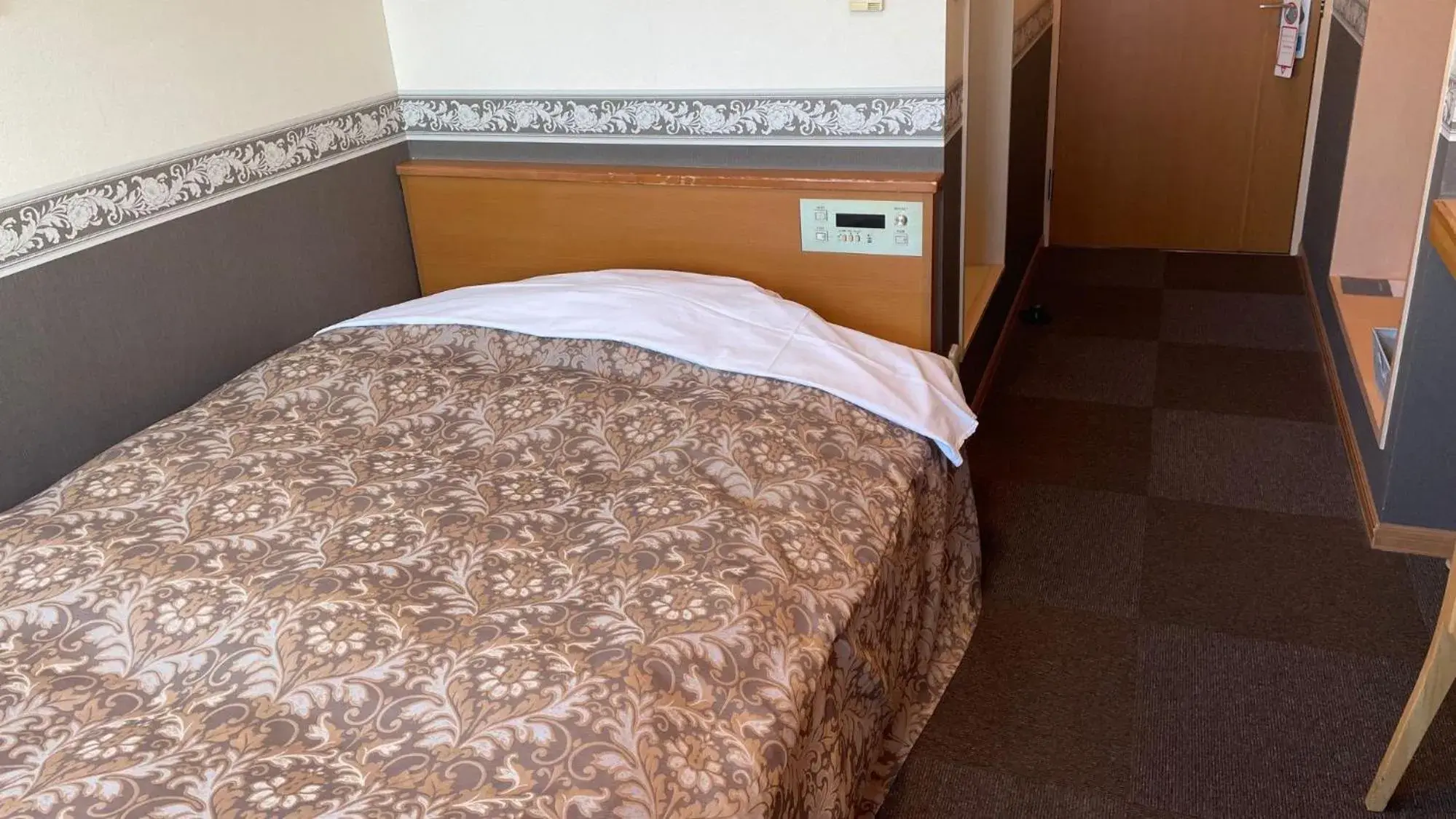 Photo of the whole room, Bed in Business Hotel Ekimae Photo of the whole room, Bed in Business Hotel Ekimae