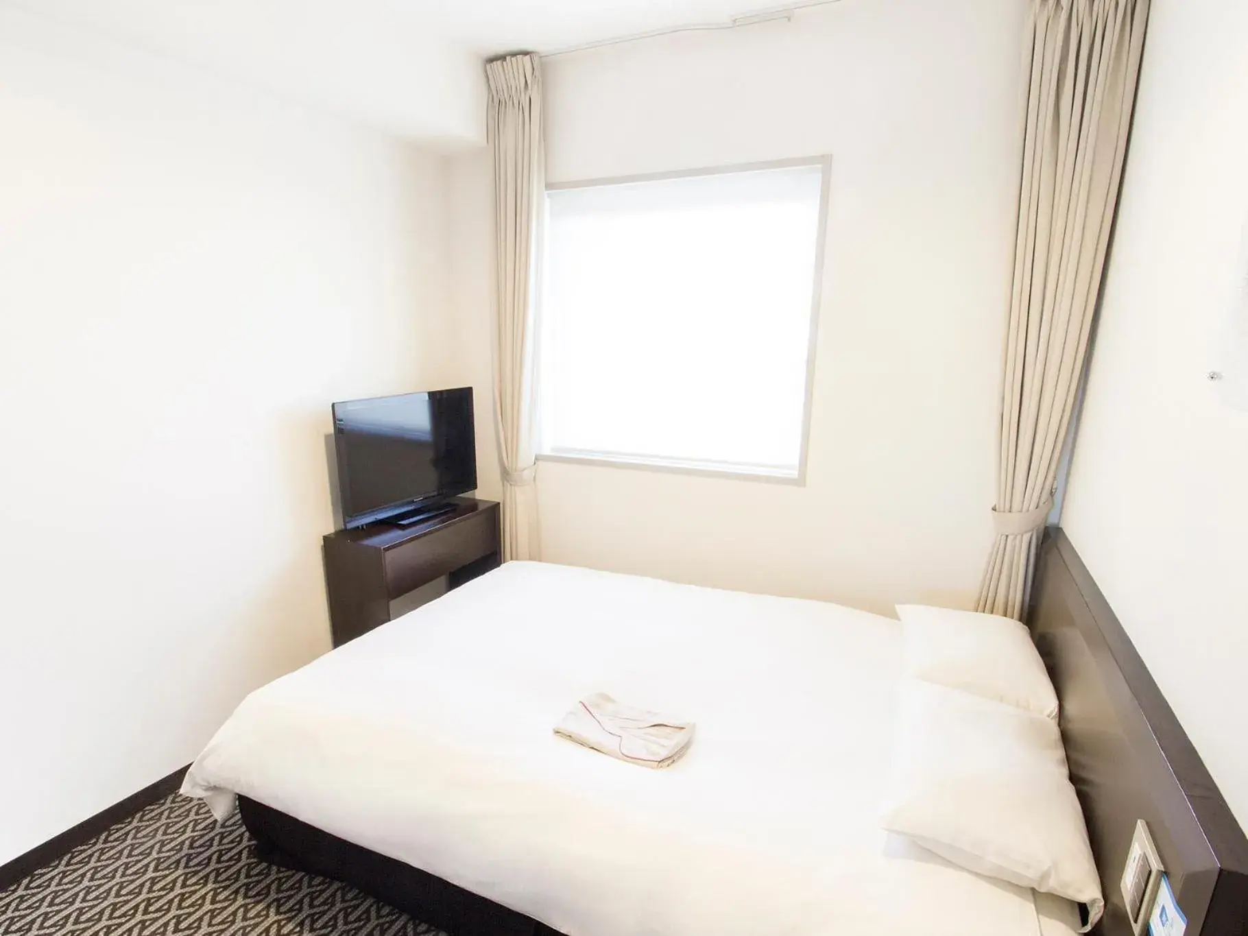 Photo of the whole room, Bed in Hearton Hotel Higashi-Shinagawa Photo of the whole room, Bed in Hearton Hotel Higashi-Shinagawa