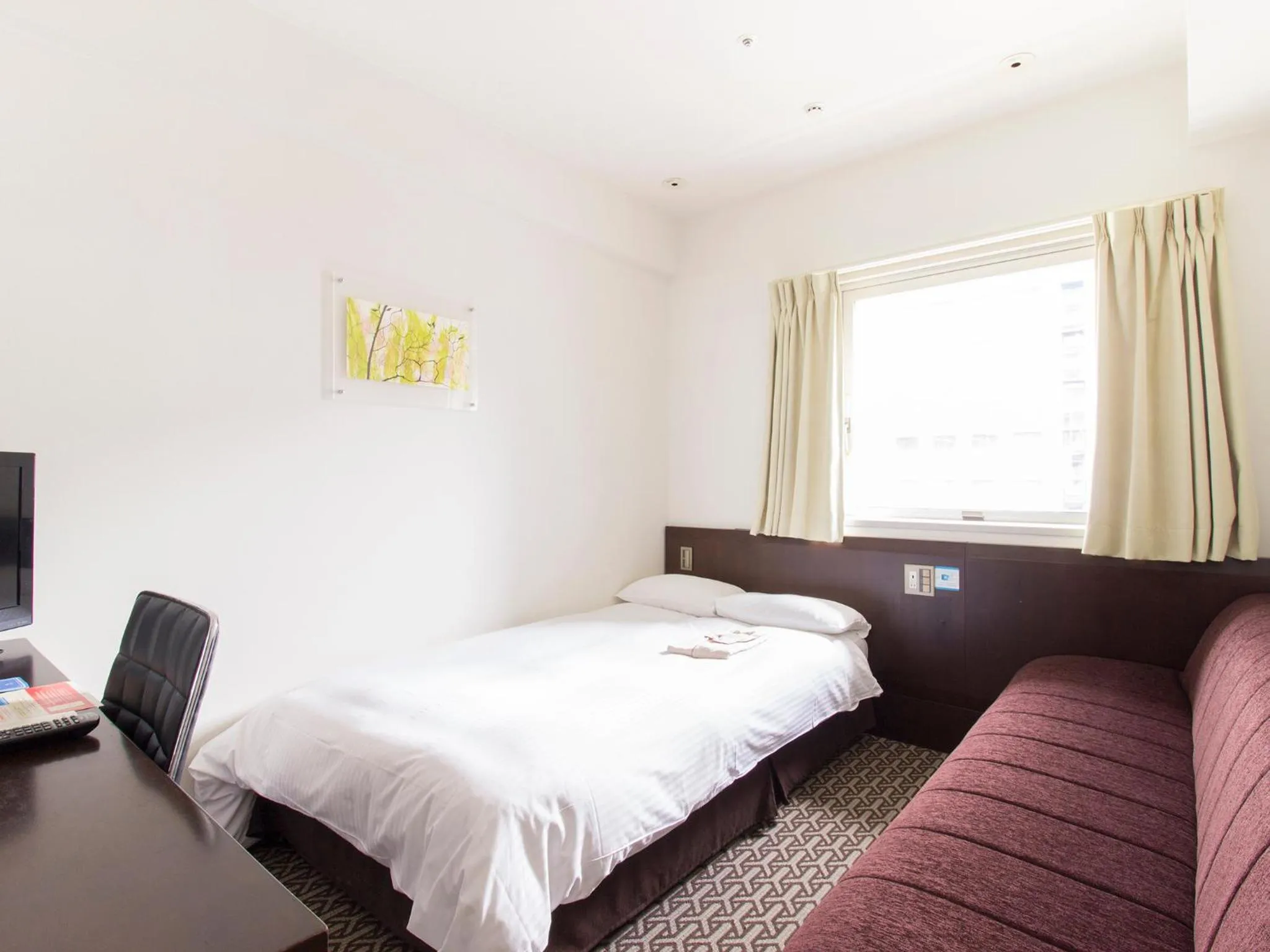 Photo of the whole room, Bed in Hearton Hotel Higashi-Shinagawa