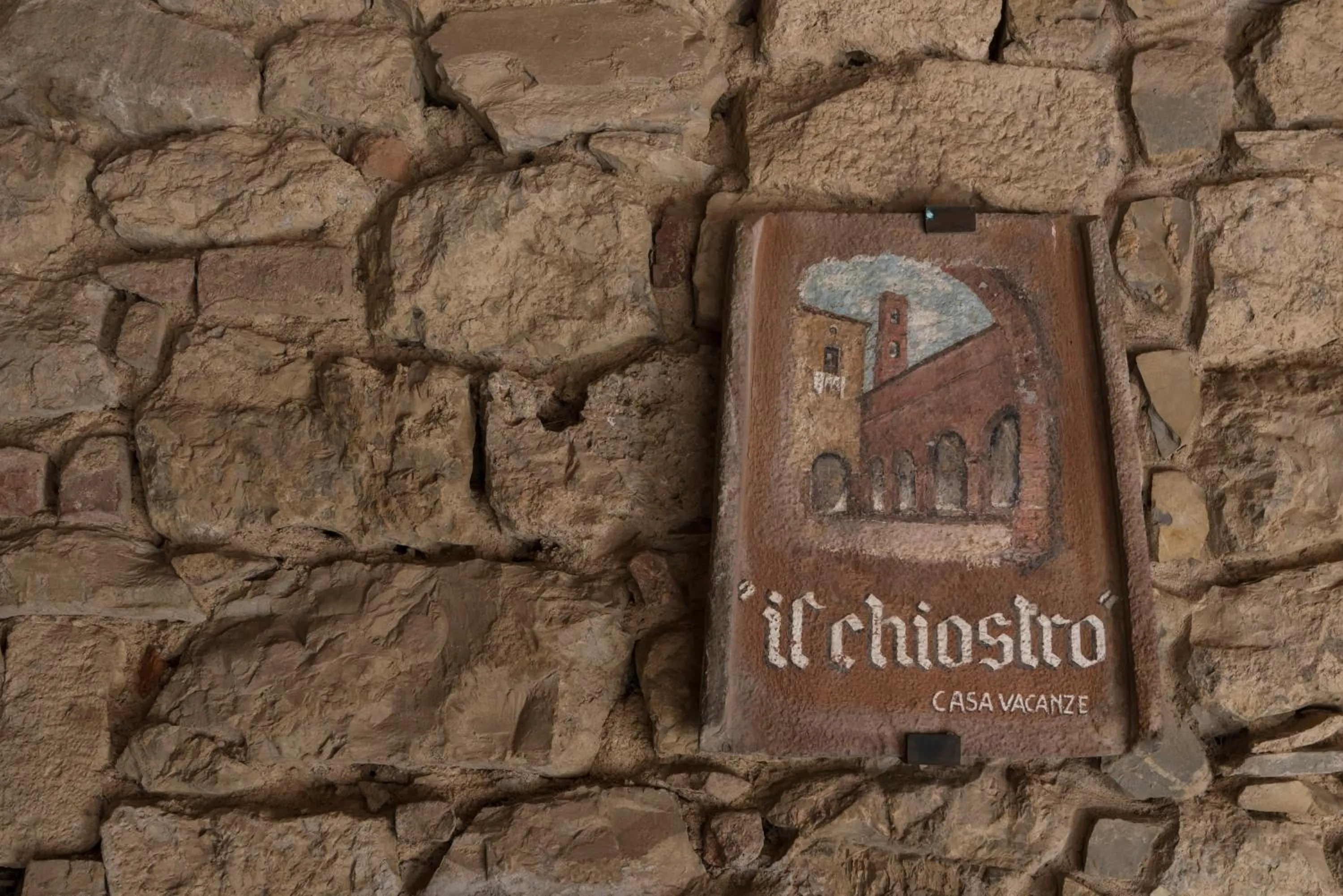 Property logo or sign in Il Chiostro Appartamenti & Suites